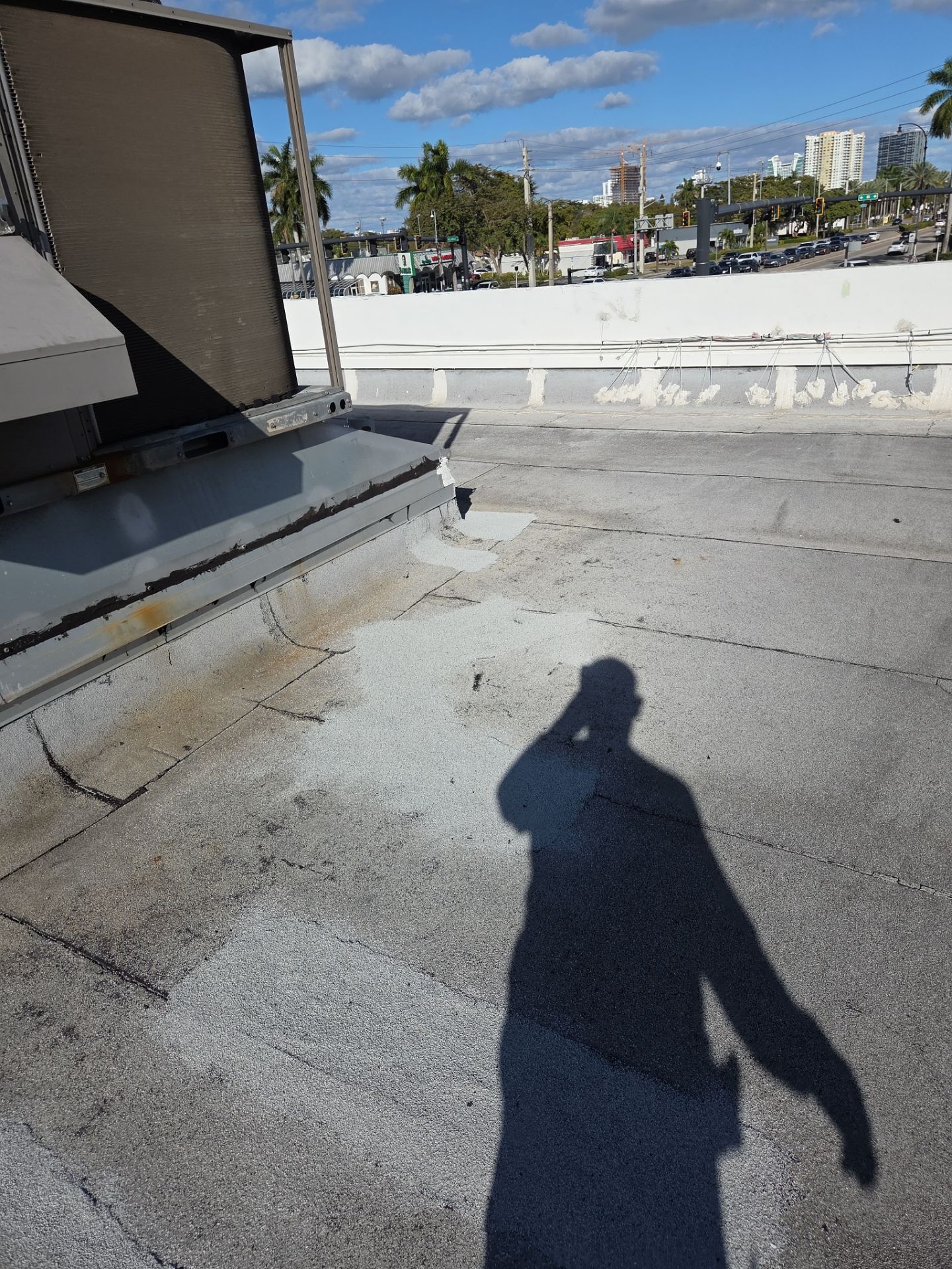 Commercial Flat Roof Restoration Using Silicone Coating in Hallandale Beach by Aastro Roofing