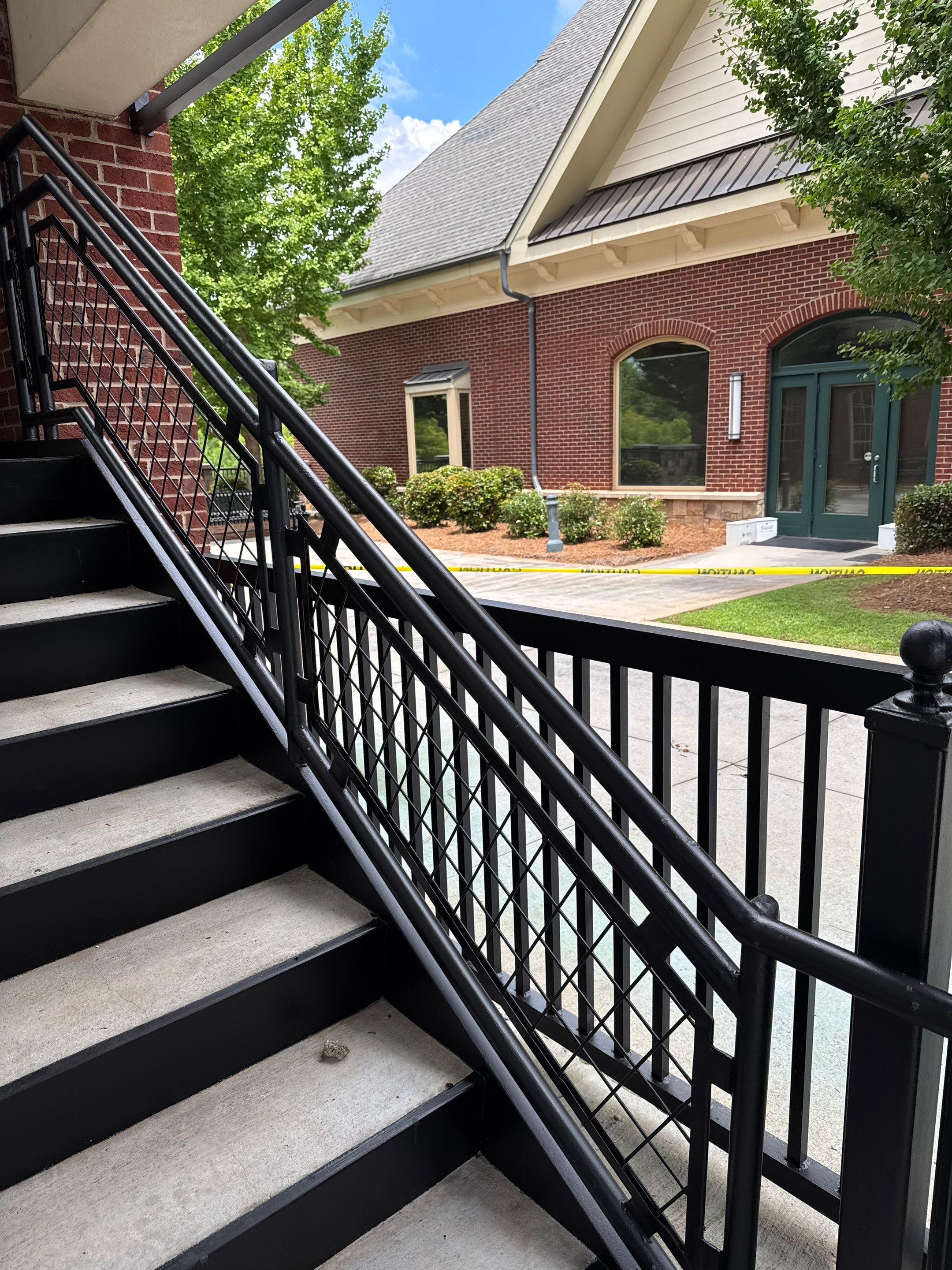 Commercial Exterior & Stairwell Painting – Corner Market by Praise God Painting, LLC