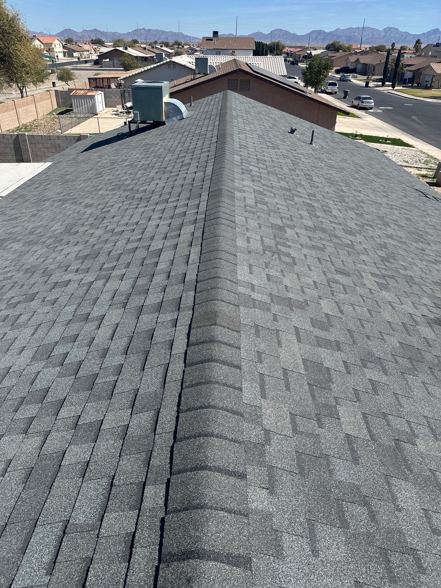 Estate Gray Shingles by Reimagine Roofing