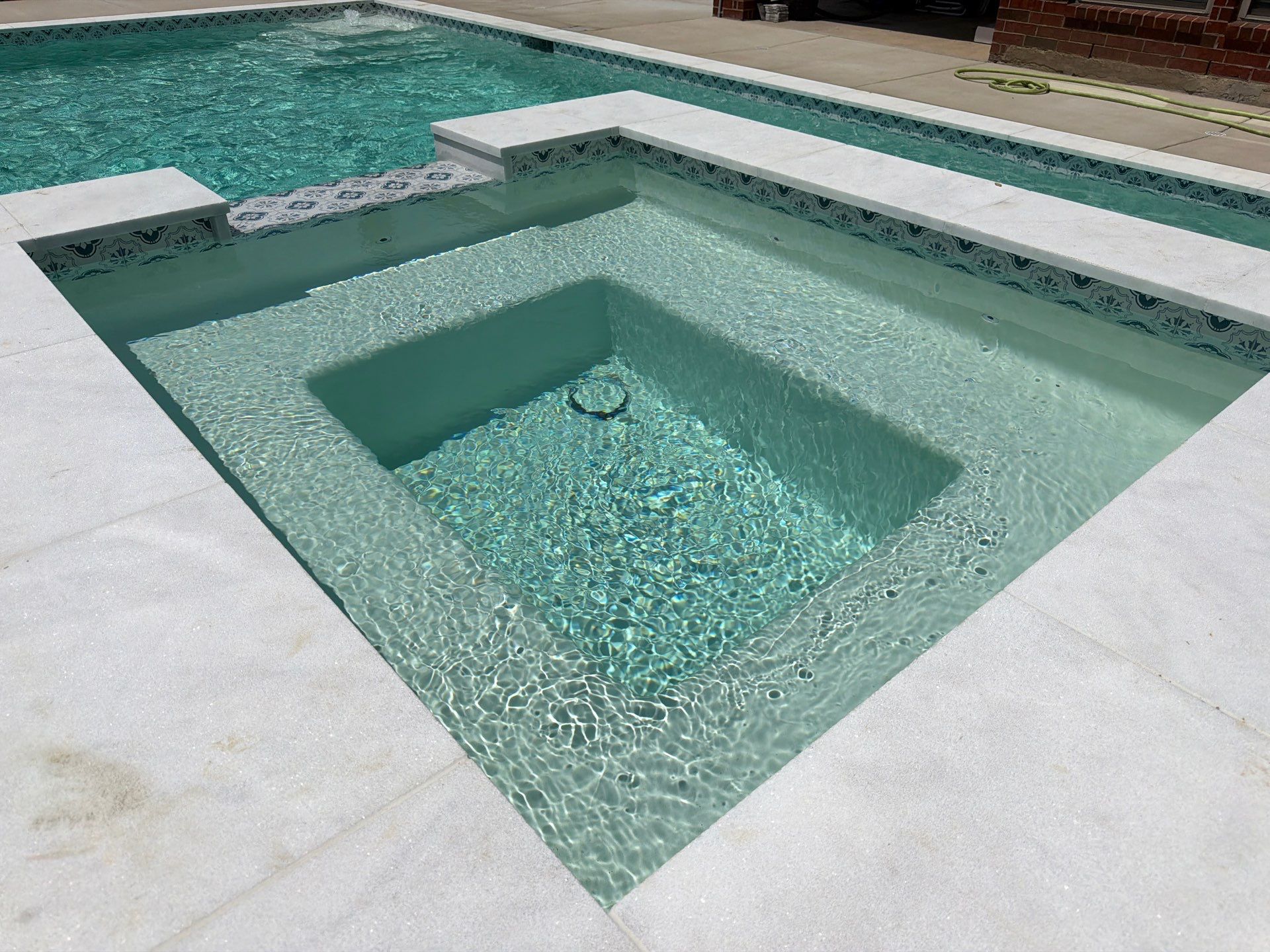 Geometric Pool with Raised Spa and Sun Shelf by Pinnacle Pools and Spas - DFW