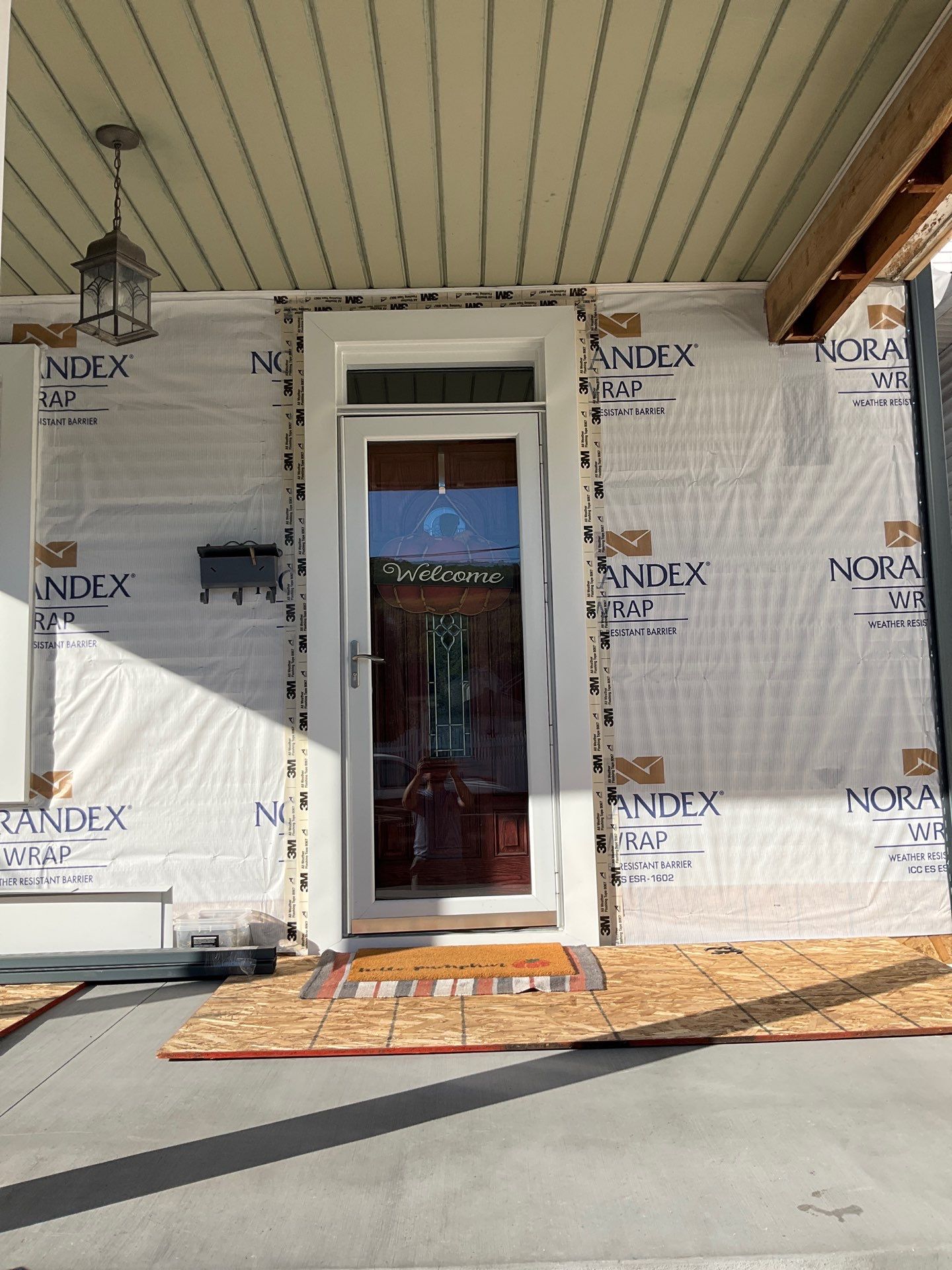 Charcoal Metal Roof & Blue Siding — A Refreshing New Look by Esh Builders