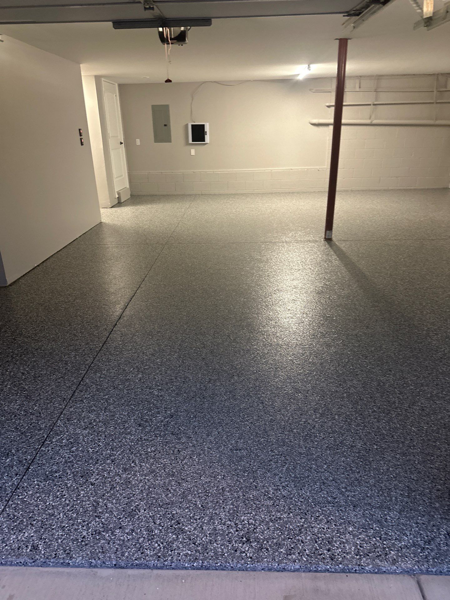 Garage Floor Coating using Wombat by My Garage Floor Guys