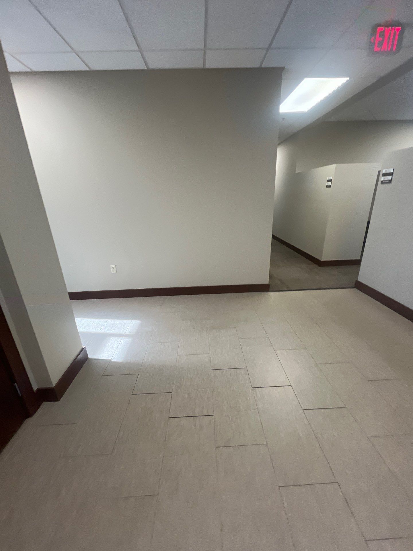Commercial Office Interior Remodel and Modern Suite Refresh in Sioux Falls by Select Painting, Coatings & Garage Cabinets