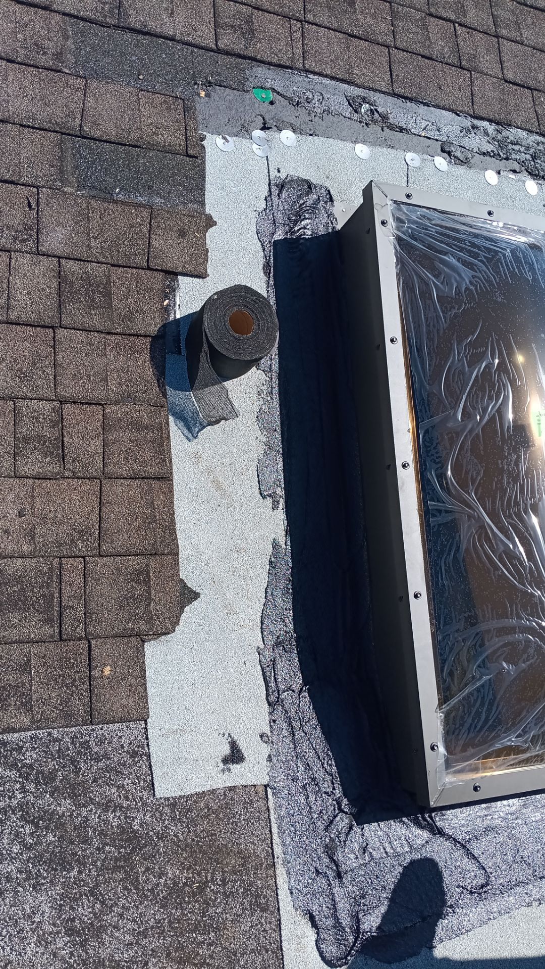 REPLACE NON APPROVED SKYLIGHT ALONG WITH CLOGED GUTTER by Morton Roofing, Inc.