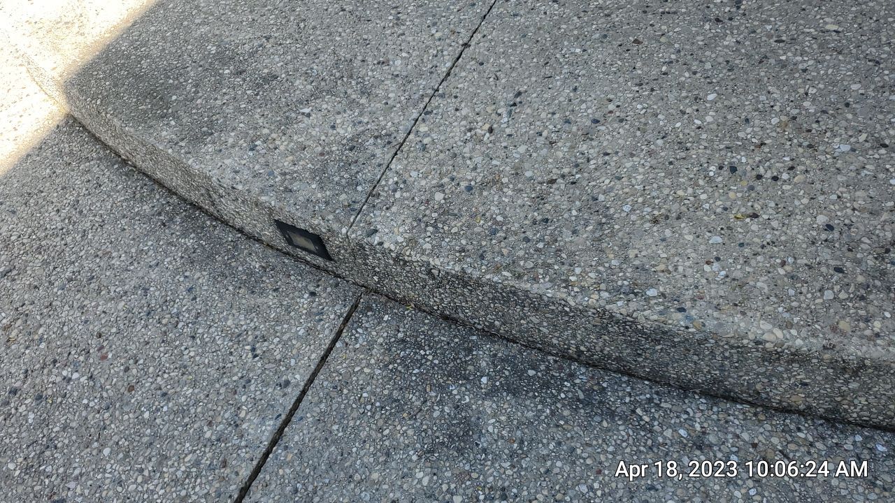 Aggregate concrete cleaning and sealing using Surebond SB-9000 by Northern Power Washing LLC.