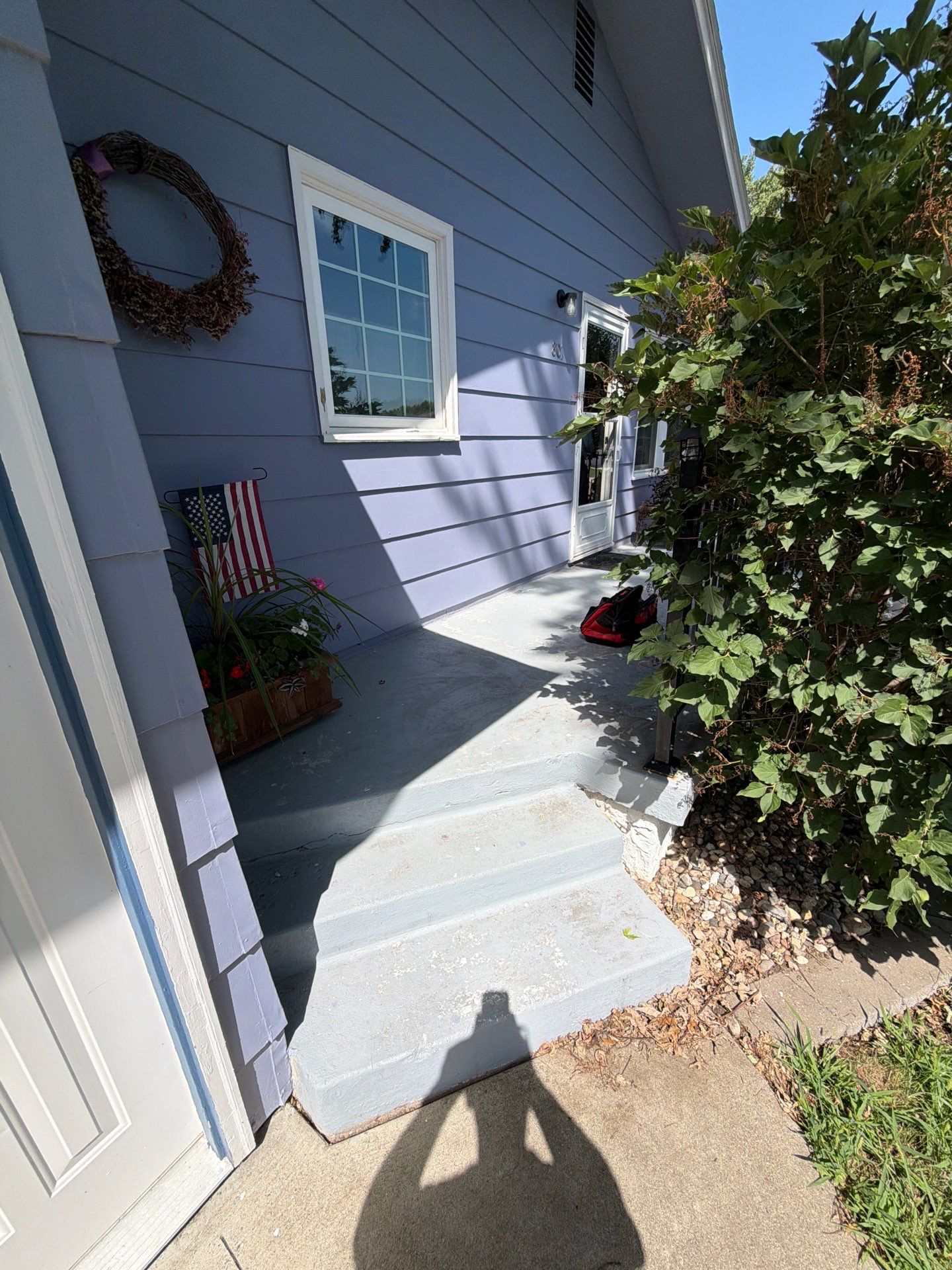 Sioux Falls Concrete Porch Coating with Starry Evening Finish by Select Painting, Coatings & Garage Cabinets