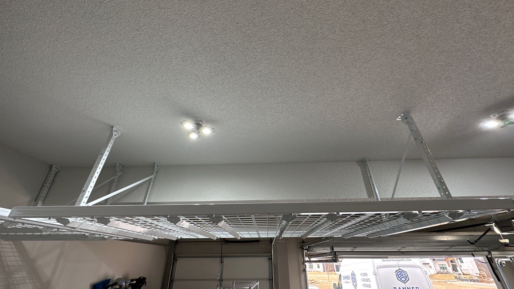 Josh H. Upgraded his storage with overhead racks by Banner Garage
