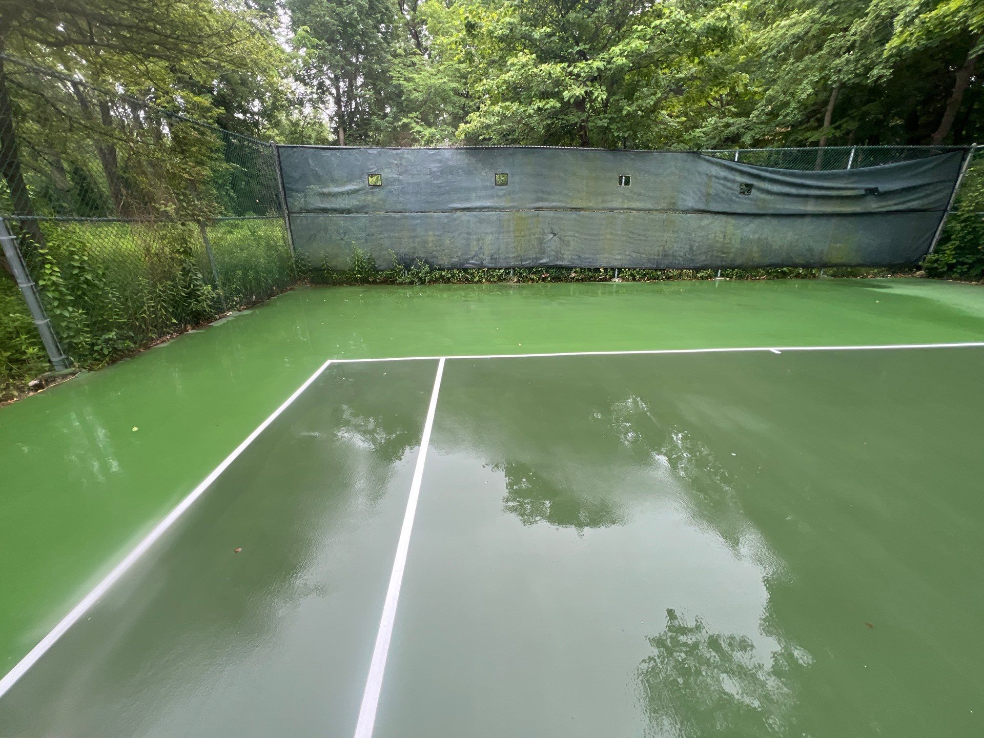 Deck, Patio, and Tennis Court Cleaning by Northern Power Washing LLC.