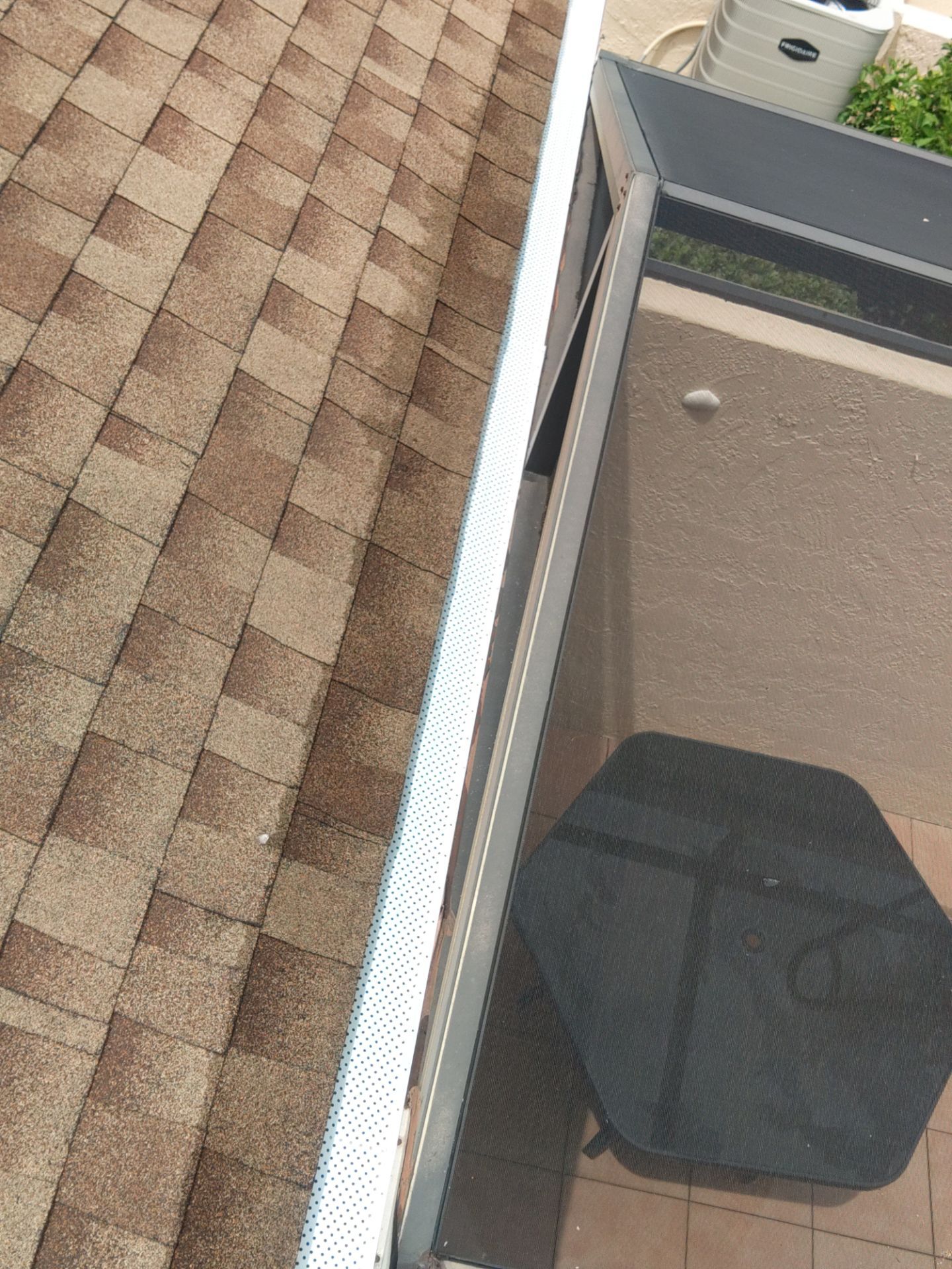 Gutter cleaning in Sarasota, FL is essential for keeping your drainage system working properly by Gutter Professors