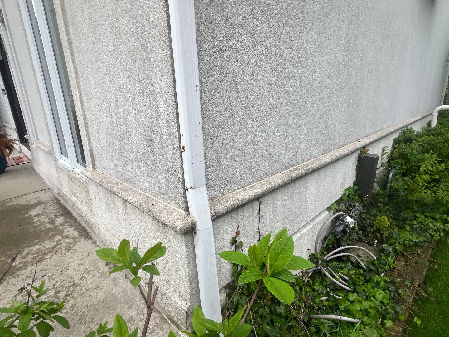 dryvit using Algaecide, soft wash soap by Northern Power Washing LLC.