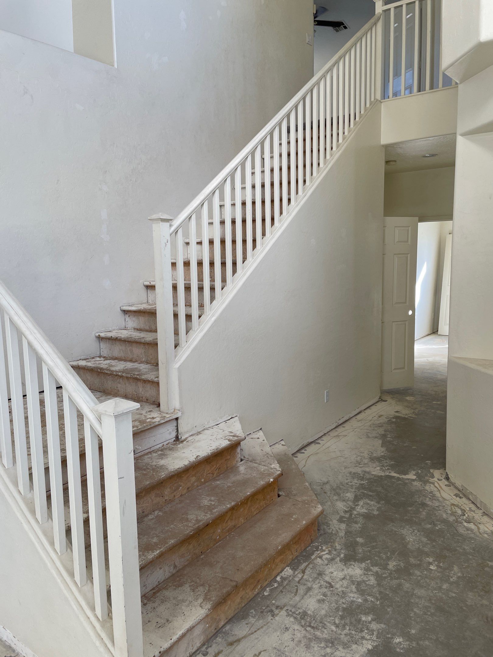 Laminate Staircase and Flooring  by Footprints Floors of Chandler 