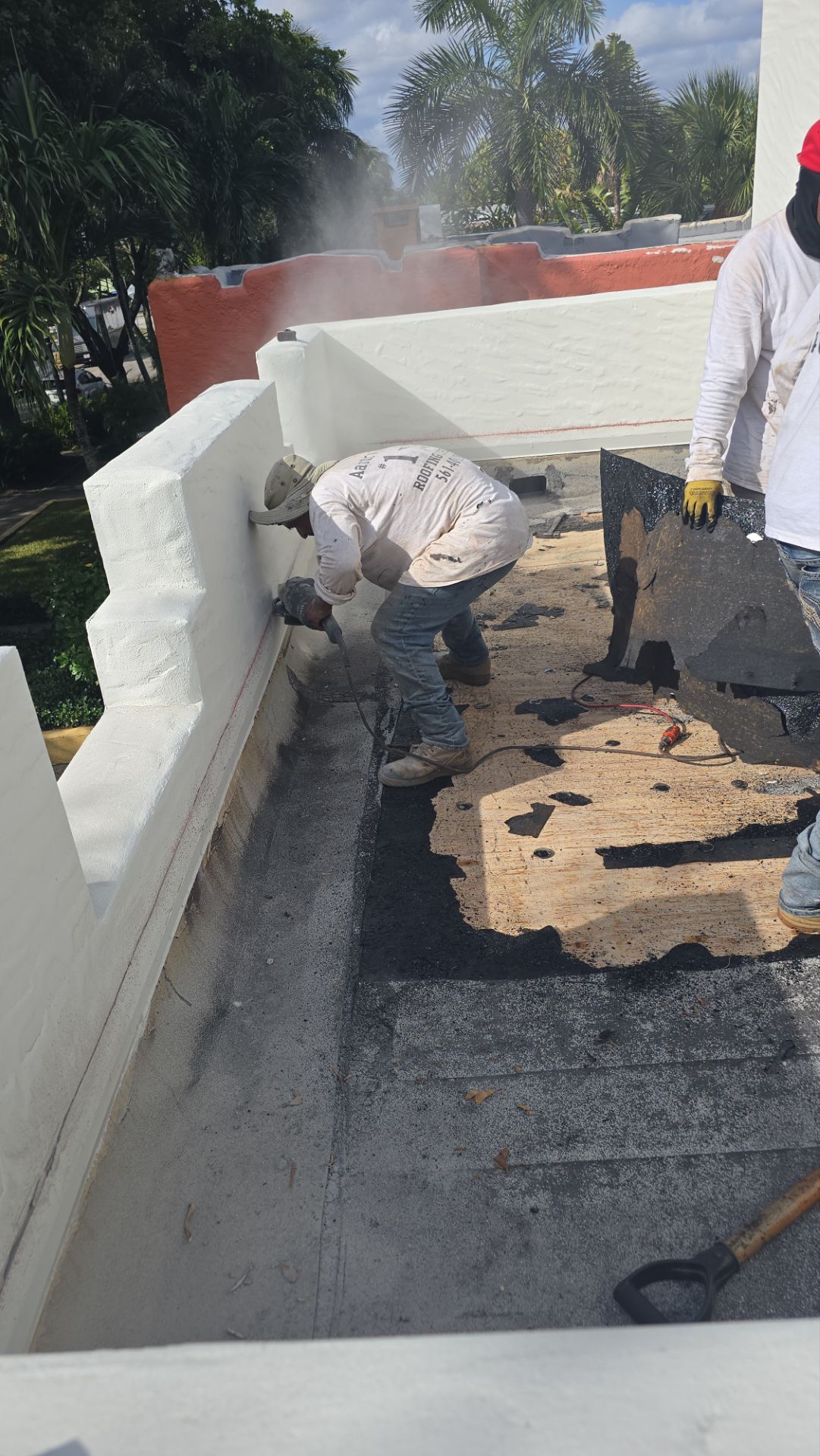 West Palm Beach Roof Restoration and Travertine Paver Driveway Installation by Aastro Roofing