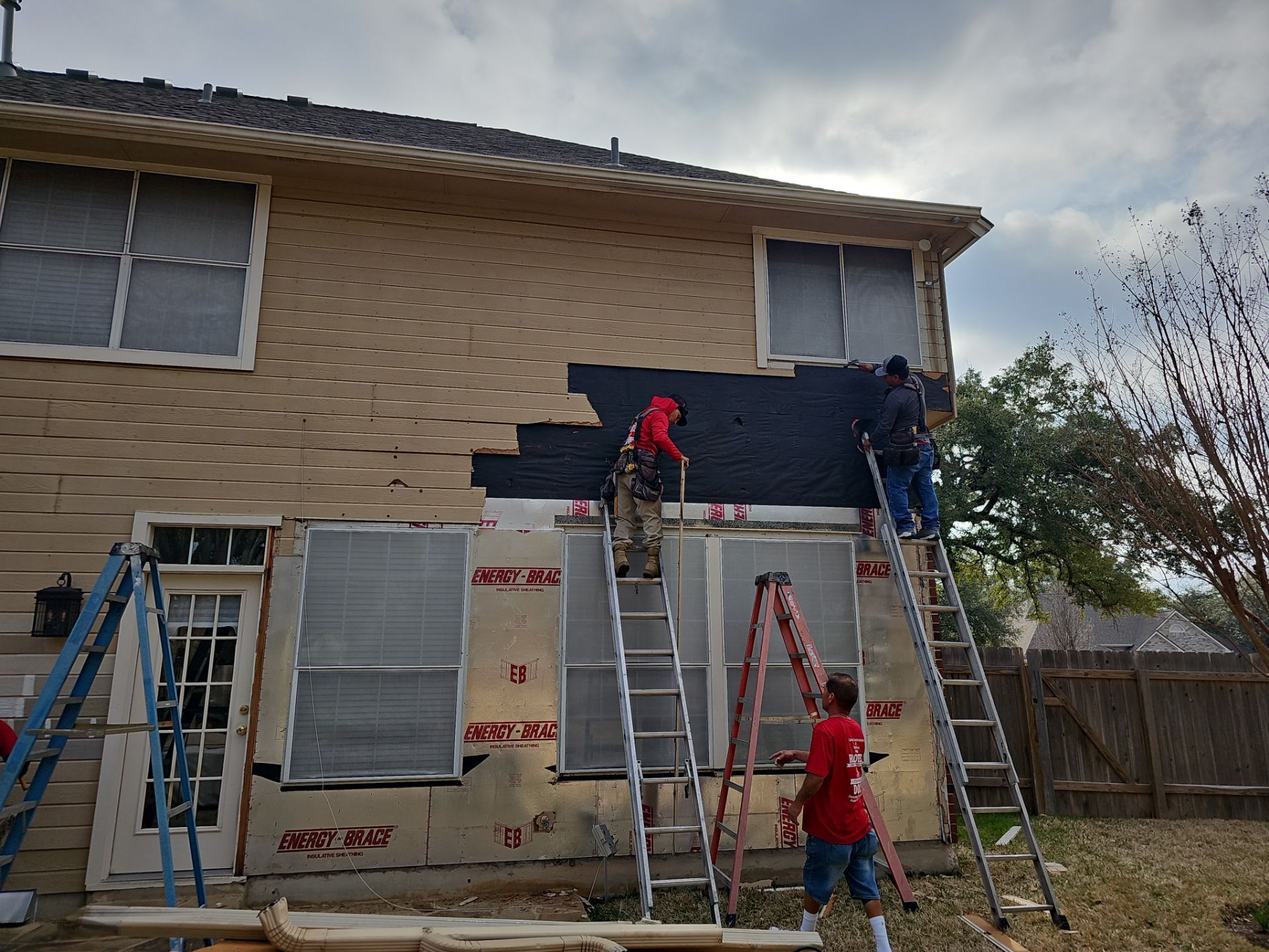 New Hardie Lap Siding & Board and Batten by DeZign Roofing & Exteriors