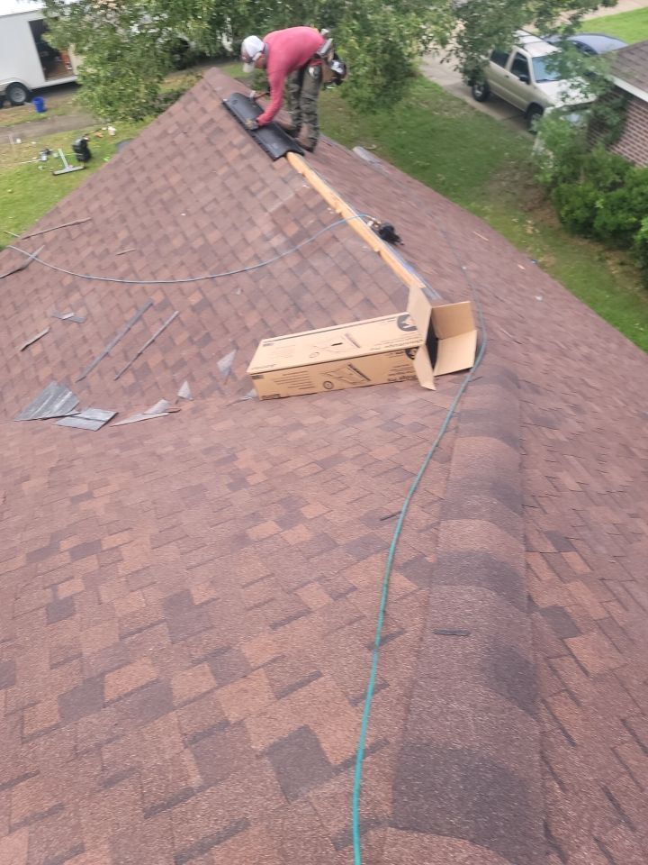 Residential Roofing Installation using Roof Replacement by American Roofing & Construction LLC