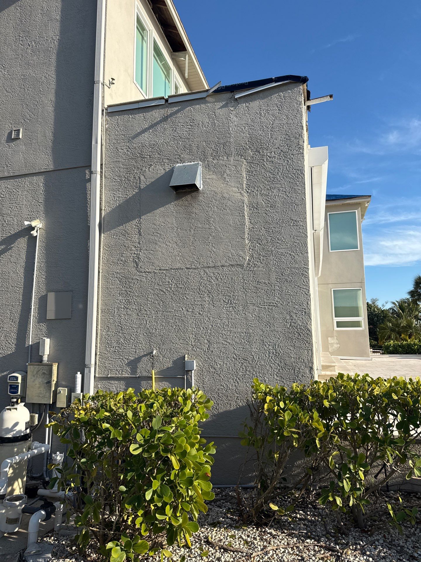 Soffit and Fascia Installation and black seamless gutters in Sarasota FL by Gutter Professors