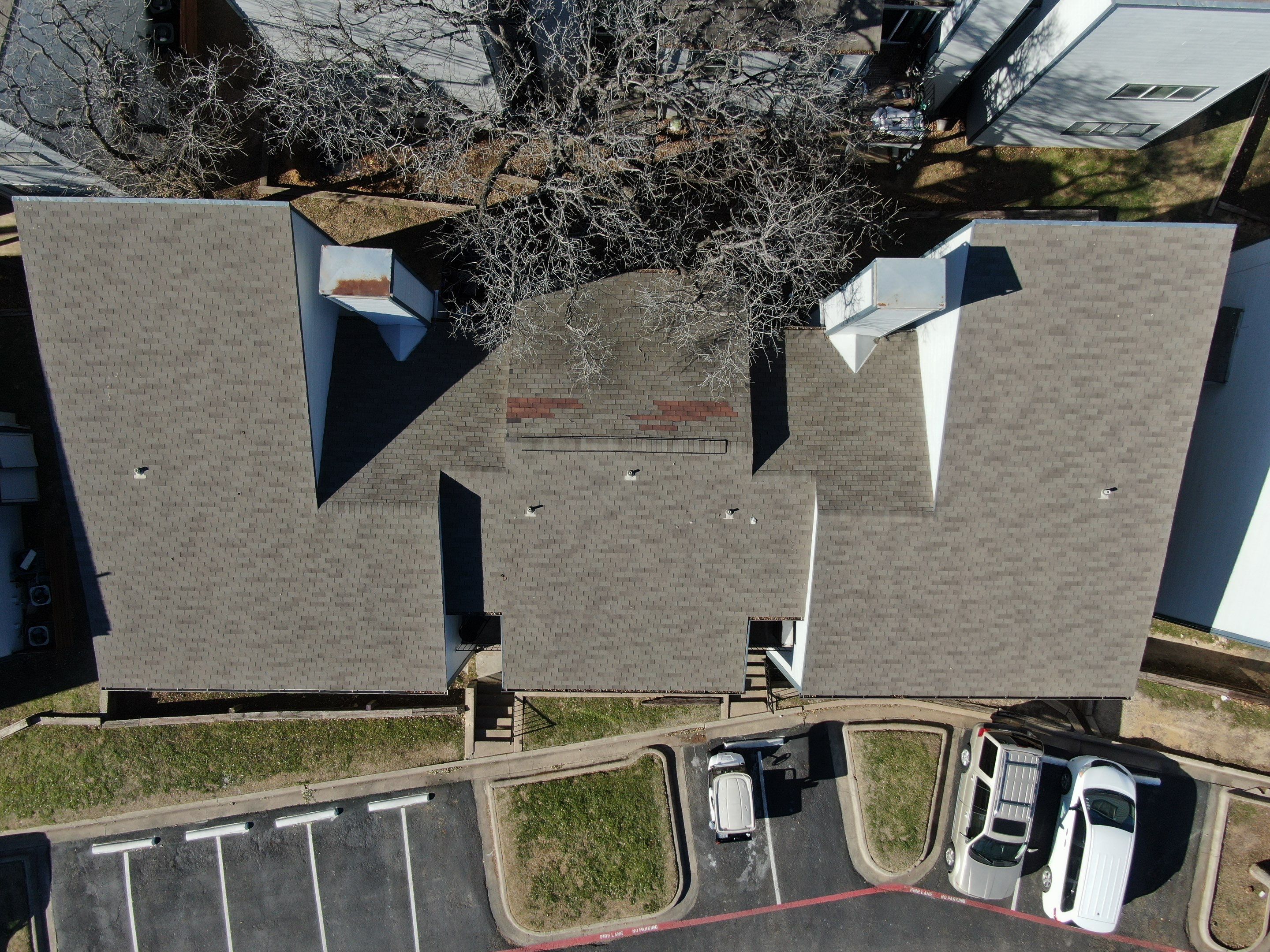Apartment Roofing Repairs using Certainteed xt25 by Becker Roofing and Exteriors