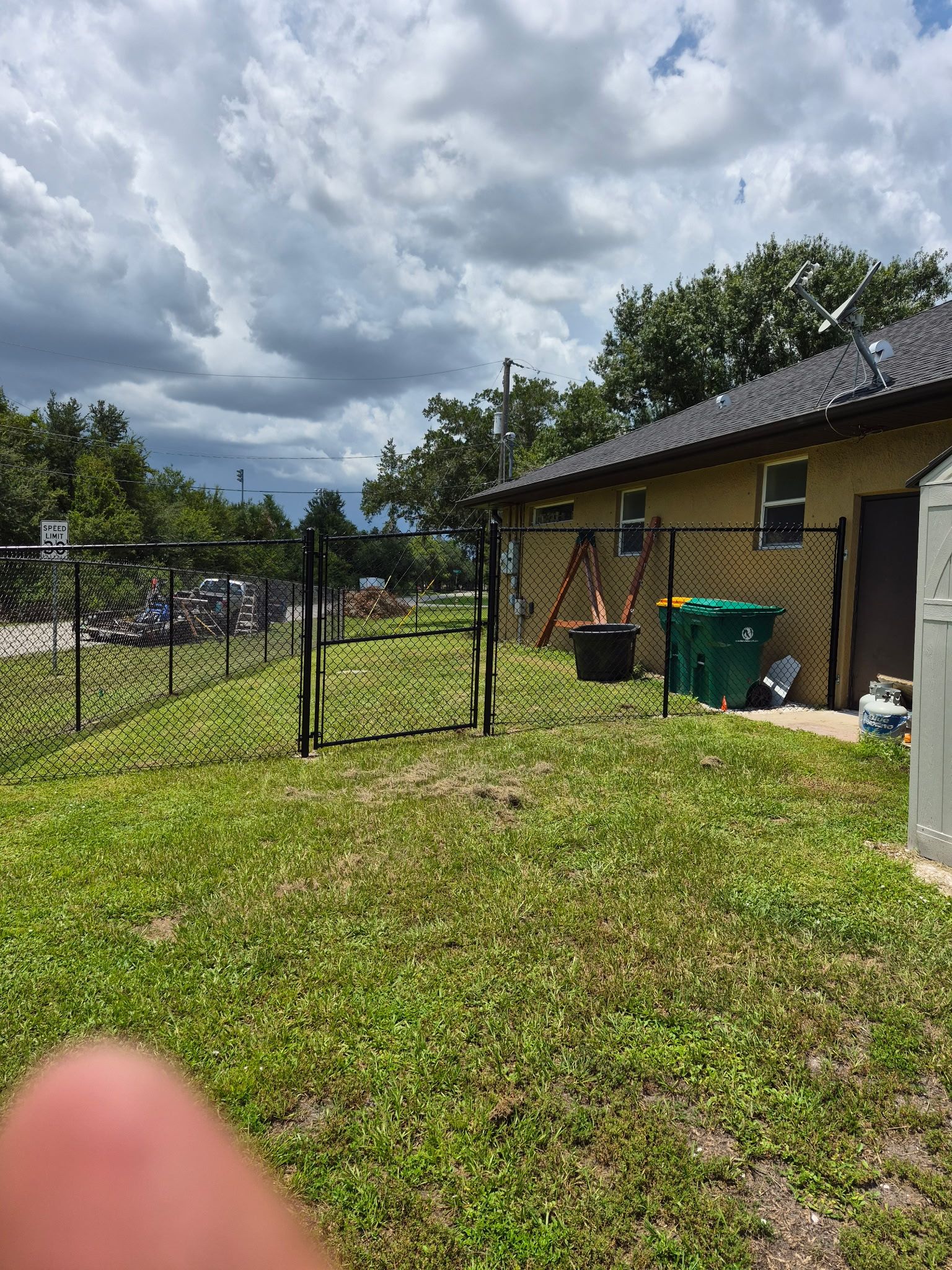 Black Chain Link Perimeter Fencing with Double Gates in Port Charlotte by True Fence LLC