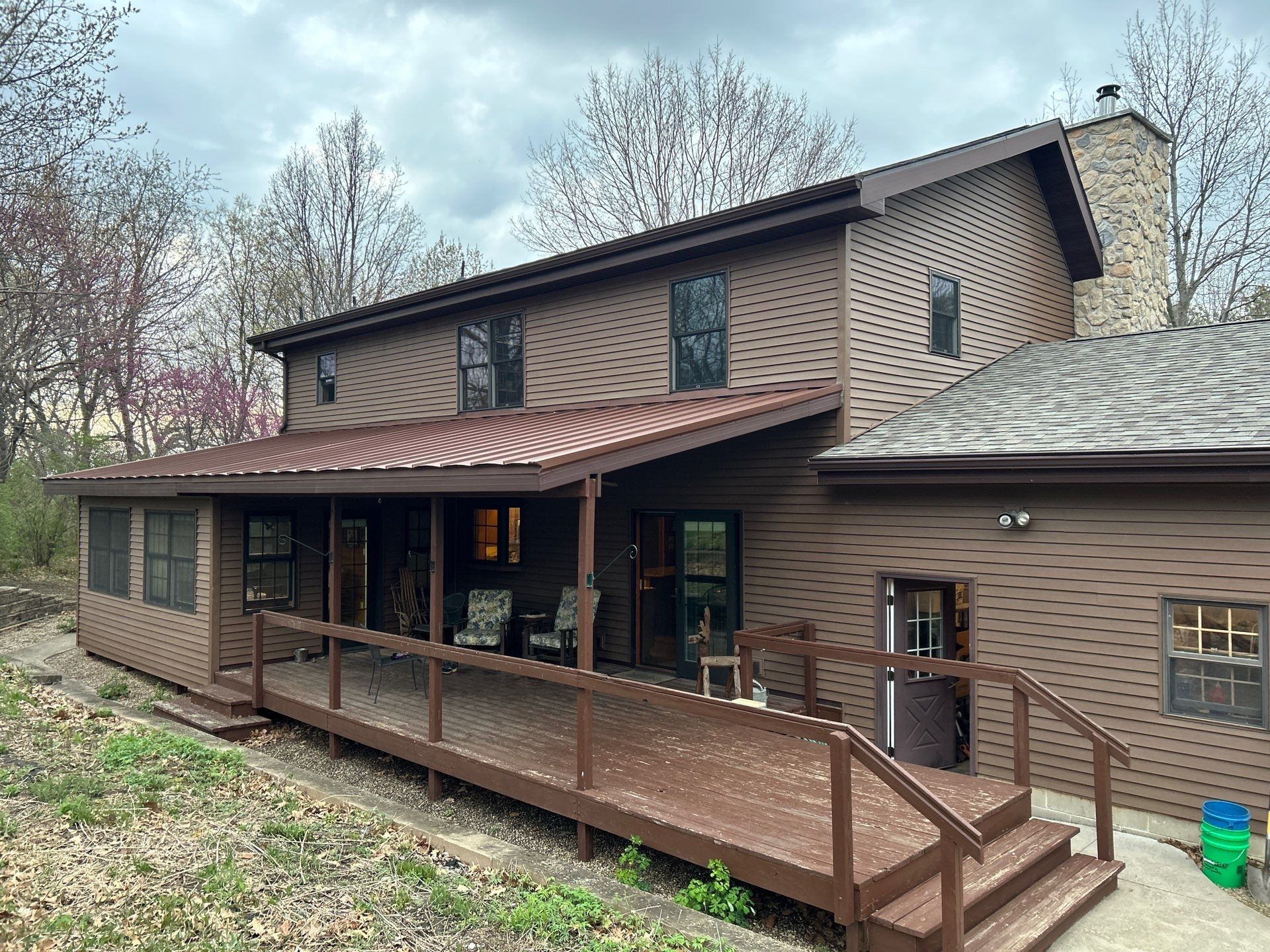 Pella Window installation using Pella Lifestyle wood/Aluminum window by United Windows and Siding LLC