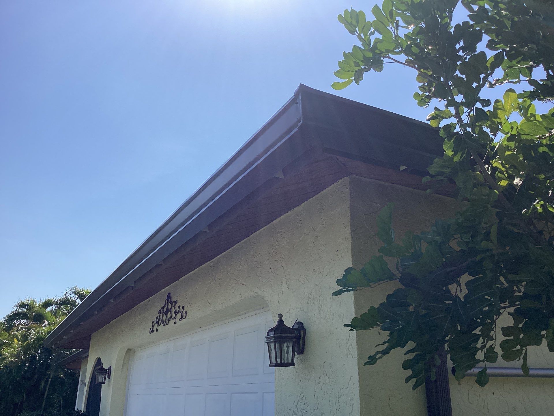 Musket Brown Seamless Gutters using 6 Inch Seamless Gutters in Cape Coral FL by Gutter Professors