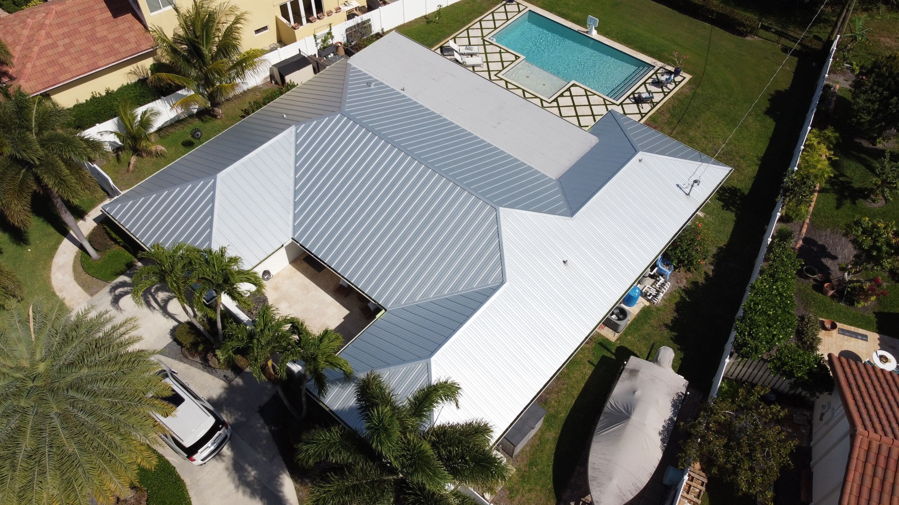 Residential Roofing Installation using 1" Nail strip metal roof by BLUES BROTHERS CONSTRUCTION CORP