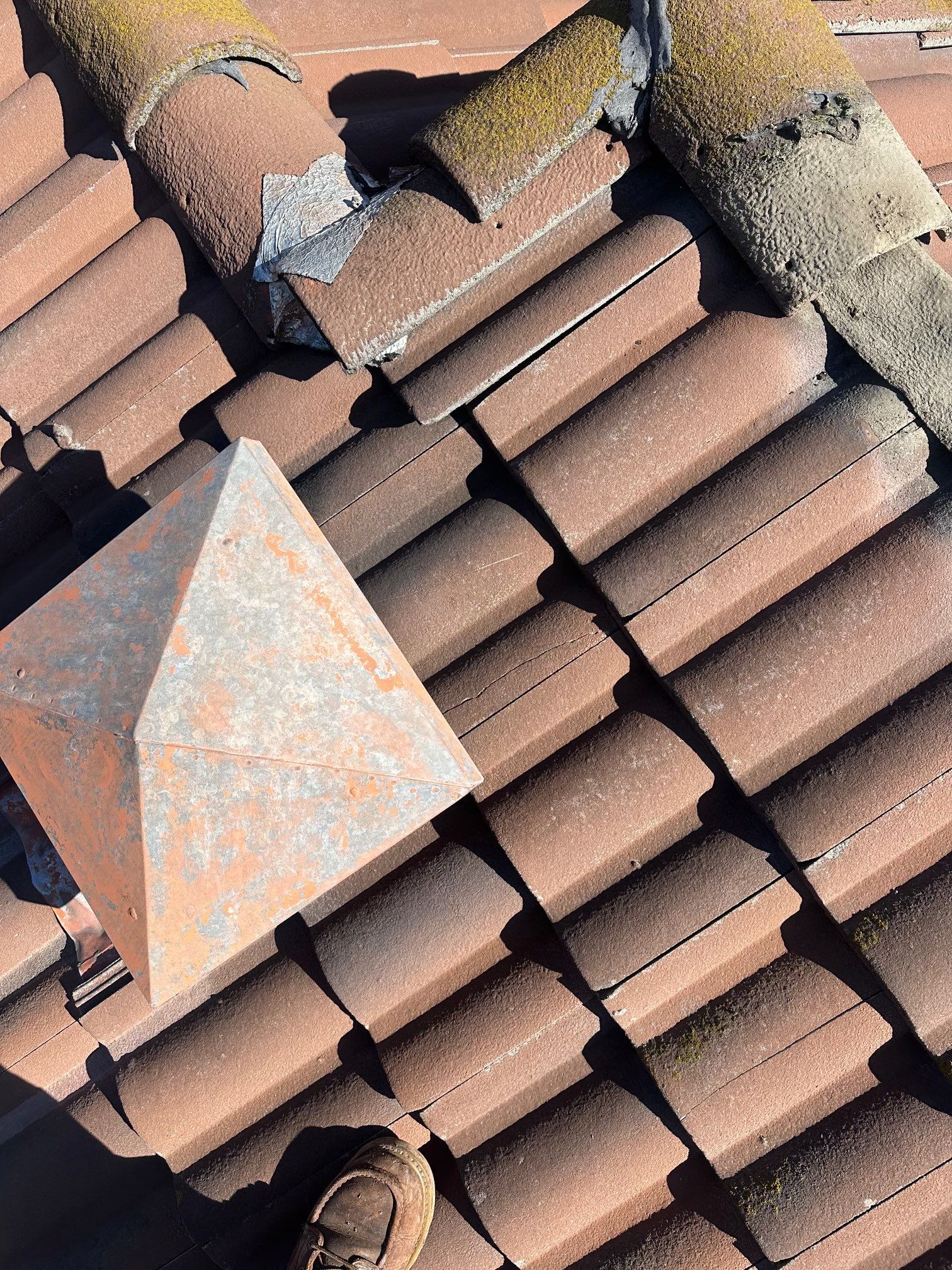 Tile Roof repair by Grandmark Service Company