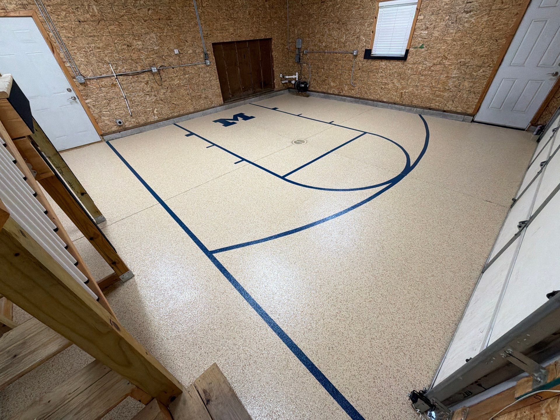 Custom Epoxy Garage Floor Completed In Norton Shores Michigan by Gordon Painting