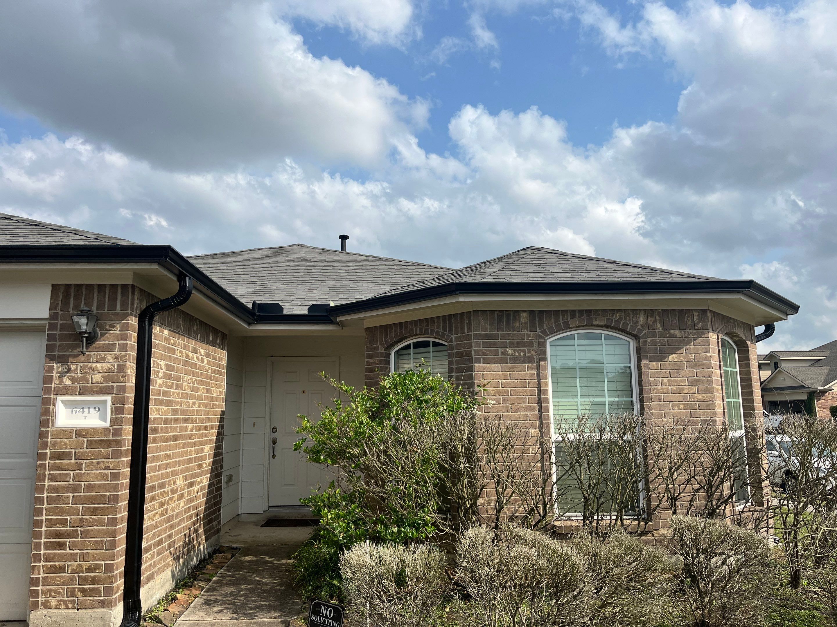 Reroof and Gutter Project in Houston by Roofing Technologies Unlimited