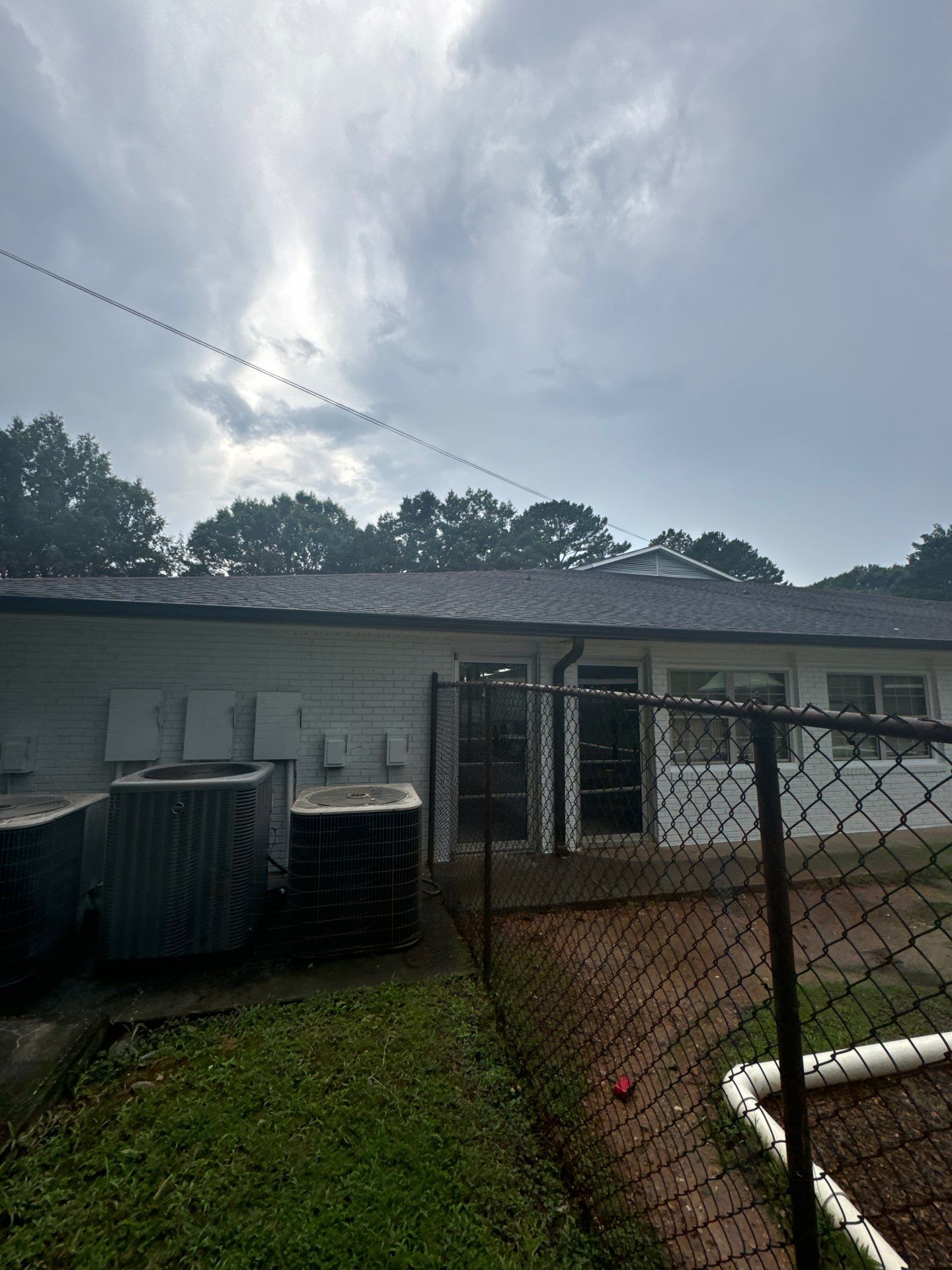 Commercial Exterior Brick and Stucco Painting in Fayetteville by Swift Home Renovations