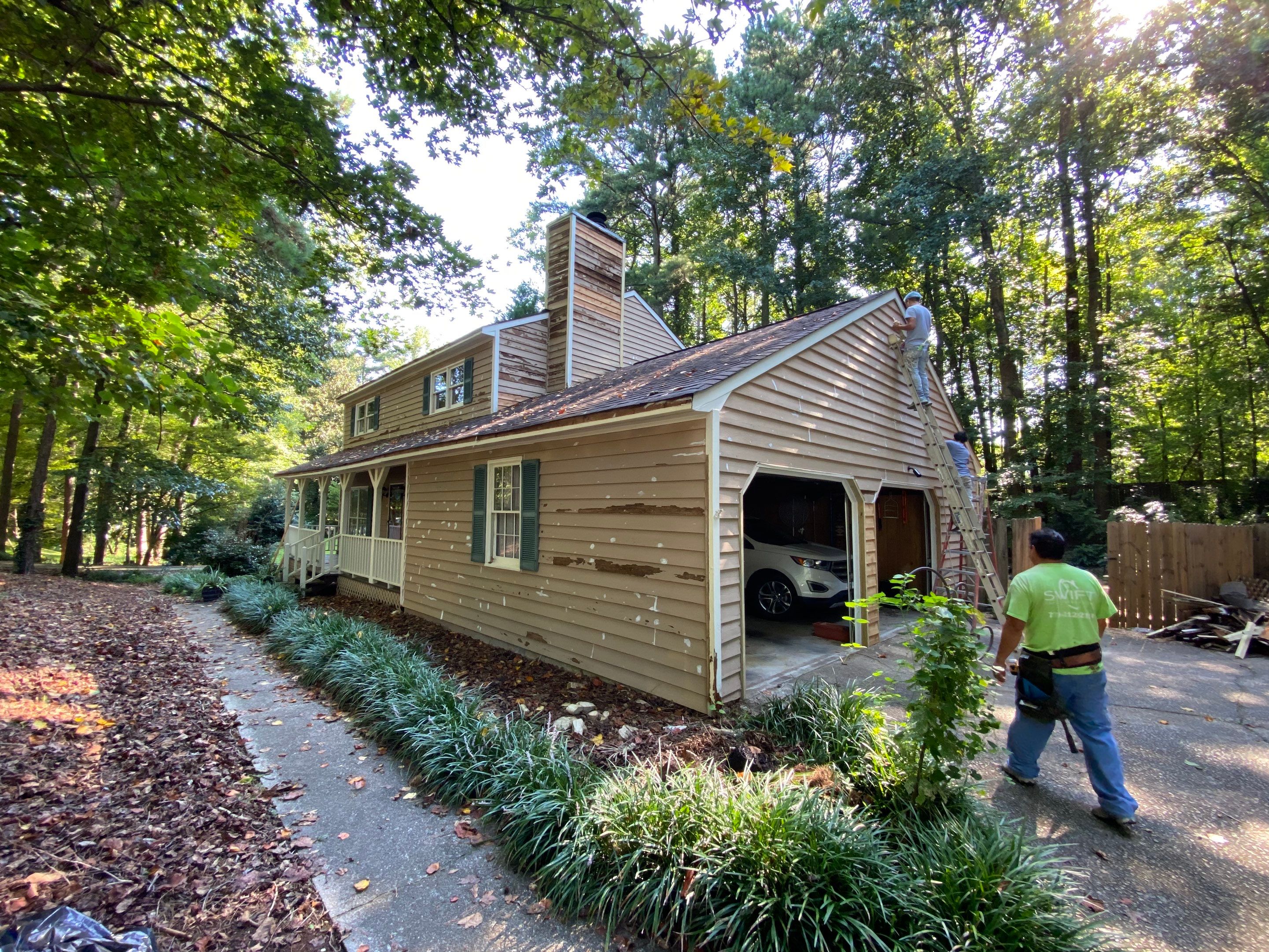Mableton Exterior Painting and Pressure Treated Wood Deck Installation by Swift Home Renovations