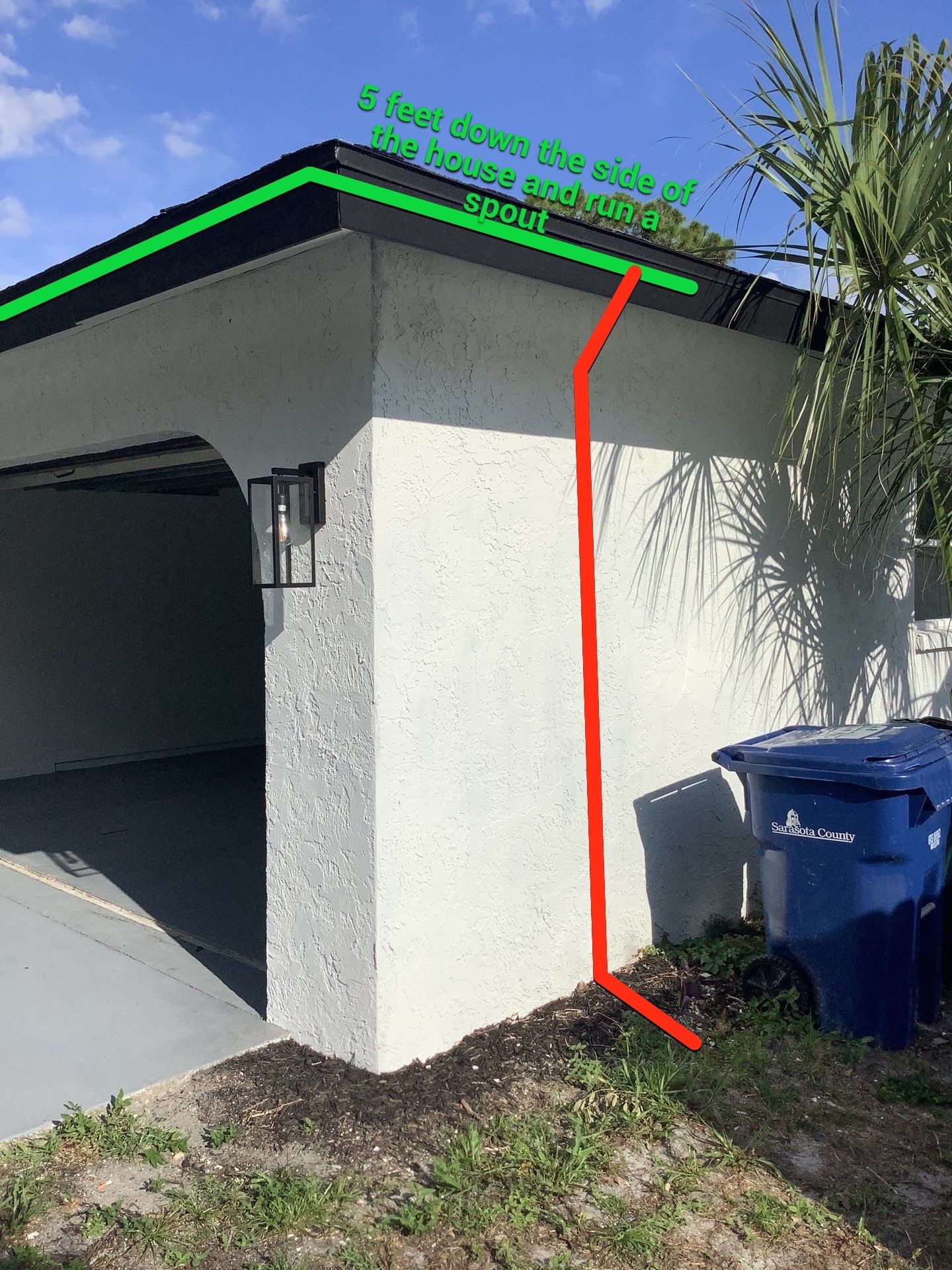 Black seamless gutters and downspouts installation in Sarasota, FL by Gutter Professors
