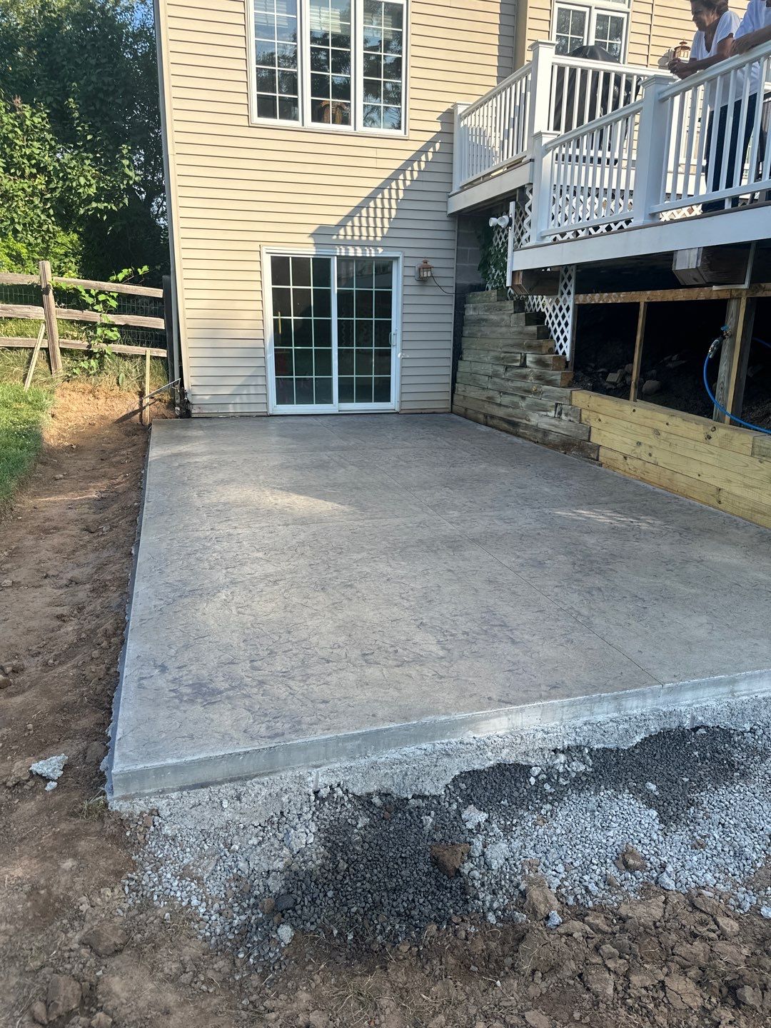 Rolled slate stamped patio  by NG Masonry & Construction LLC