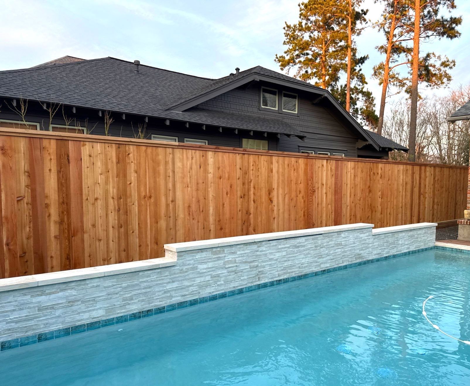 Durable Fence & Gate Installation with Premium Stain by Tim's Fences