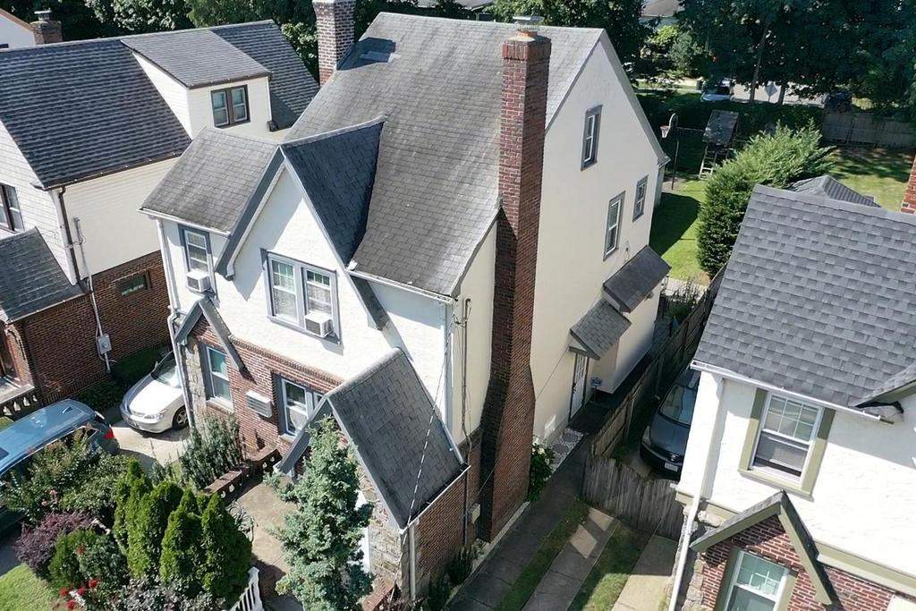 New Roof & Gutters by Island Roofing Inc.