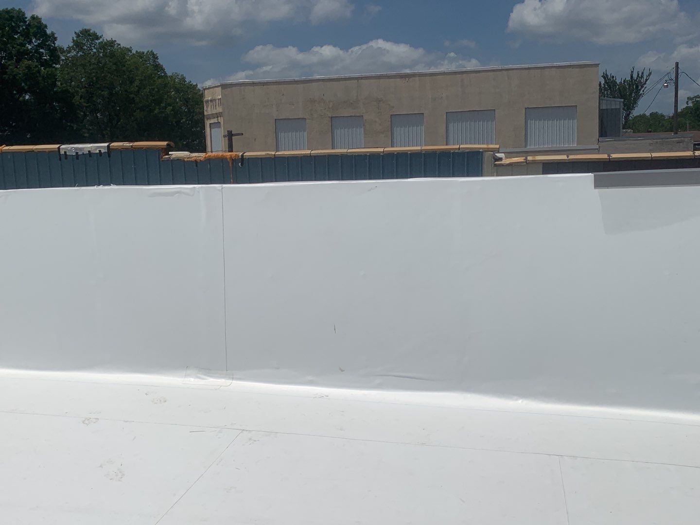 Commercial Roofing Installation in DeQueen, AR, using 50 mil PVC by Hostetler Roofing