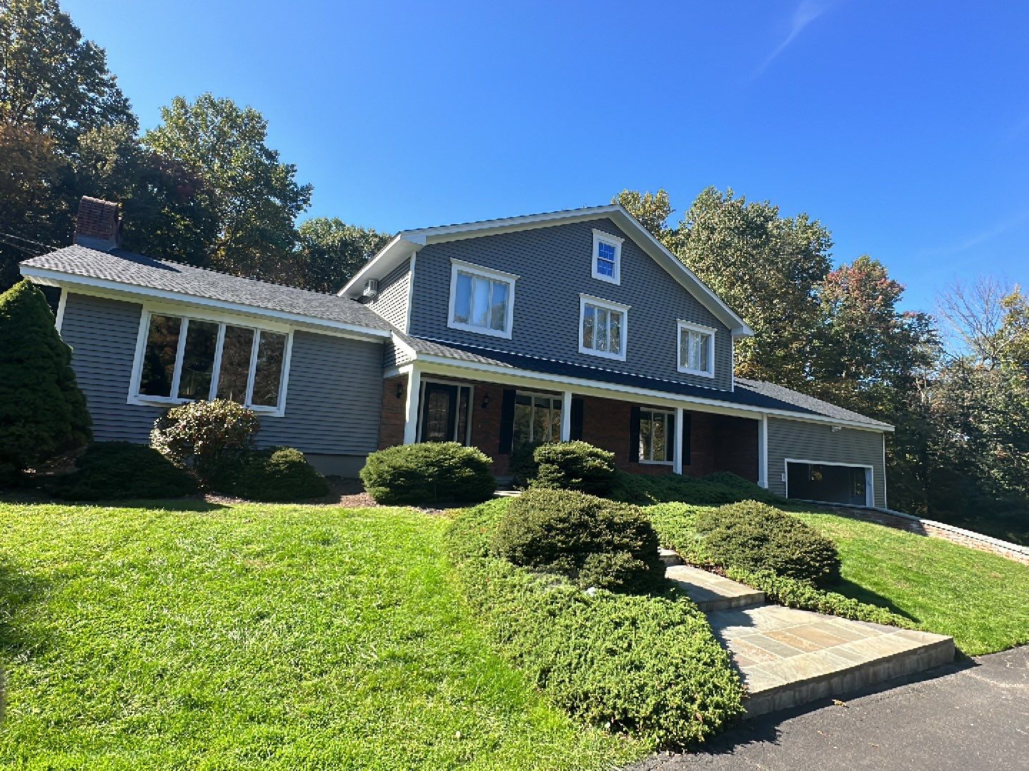Residential Roofing Installation using Owens Corning TruDefinition Duration AR - Onyx Black & New Siding Using Mainstreet Charcoal Gray by A Plus Exterior
