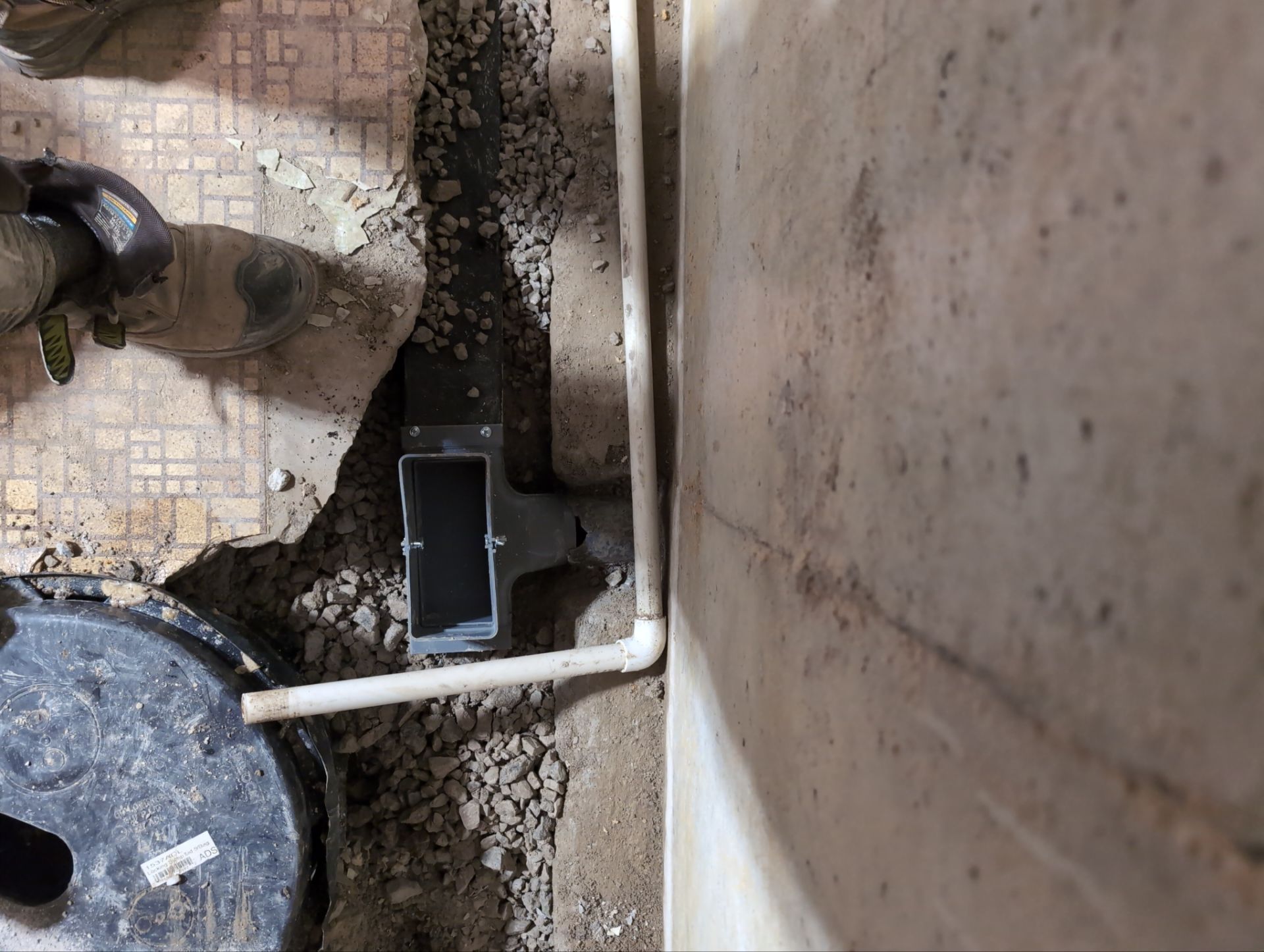 Interior Basement Waterproofing System and Egress Window Installation by Toledo Basement Repair 