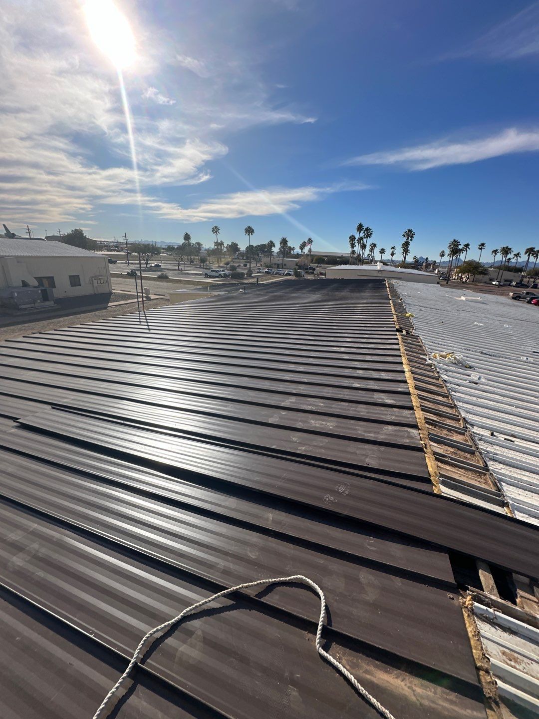 Burnished Exposed Fastener by Reimagine Roofing