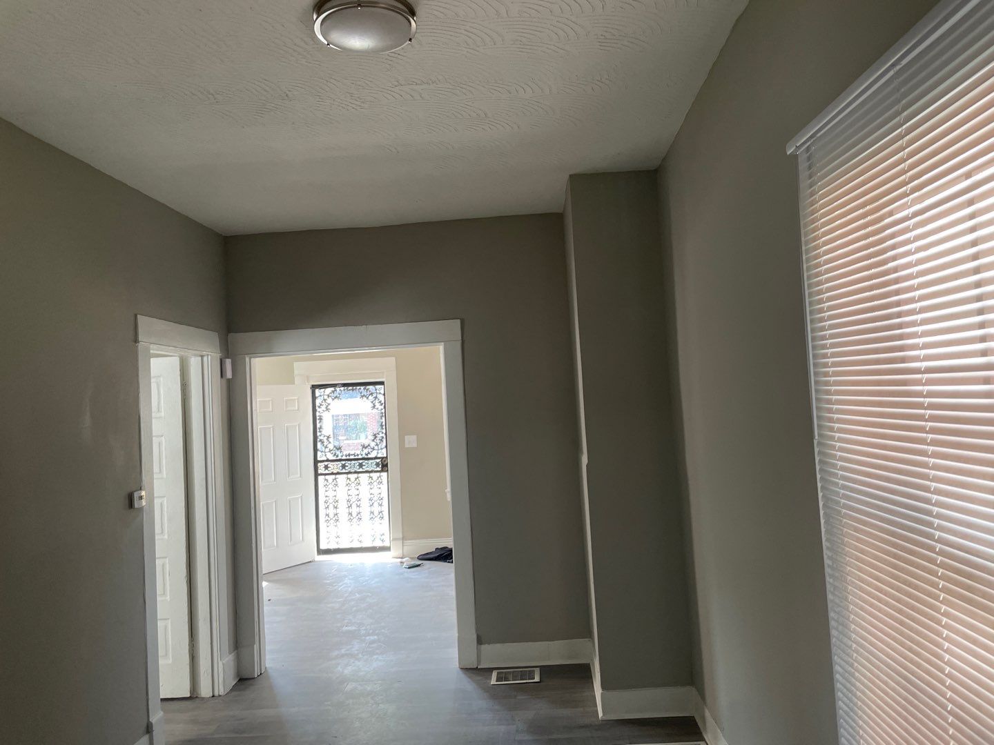 Rental Property Restoration, siding, flooring, gutters, landscaping by Storm Contracting 