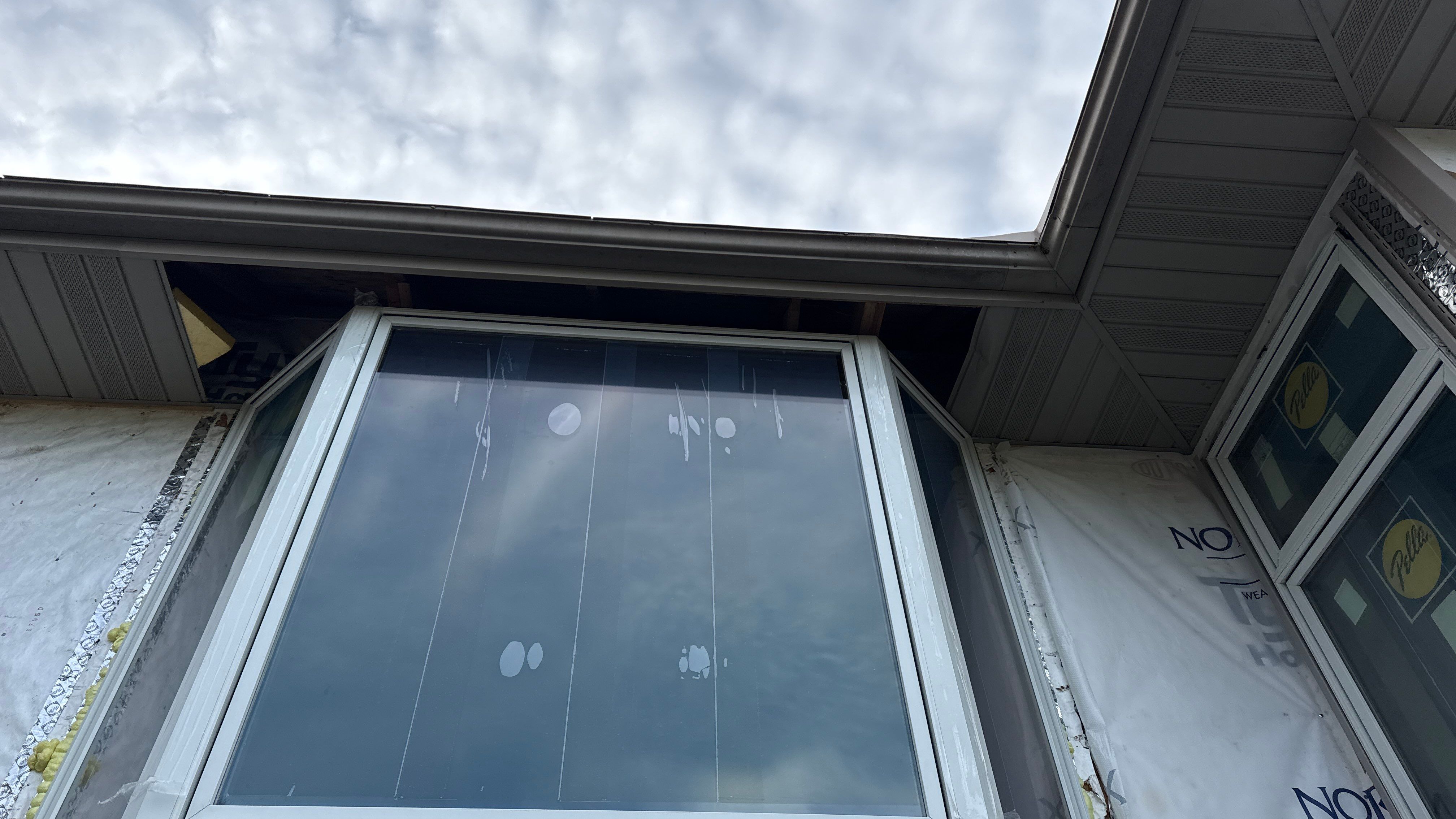 A Clean Window Upgrade Ready for New Siding with Pella Lifestyle Series by United Windows and Siding LLC
