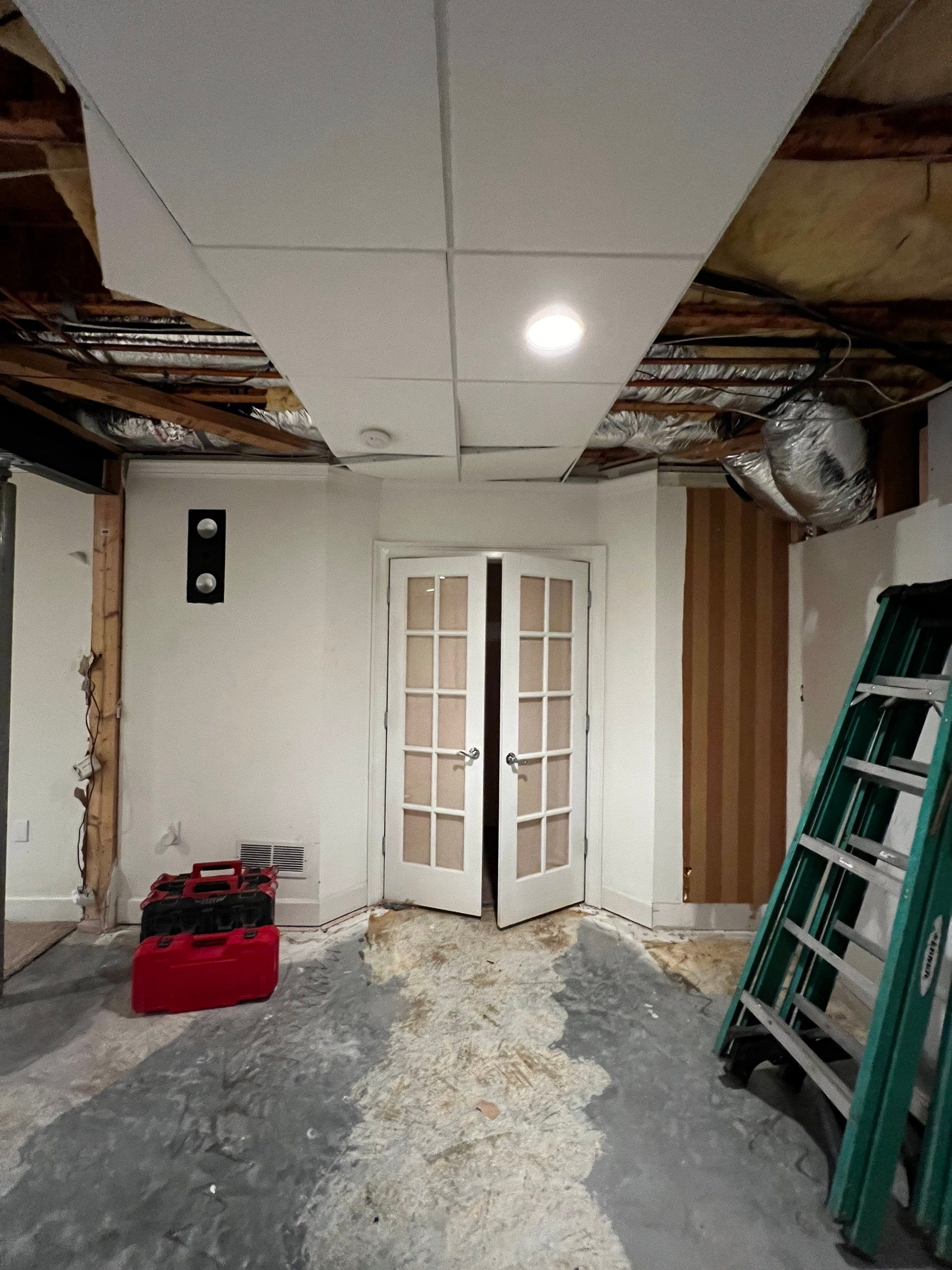 Finished Basement Renovation Featuring Home Theater and Custom Wine Cellar by Swift Home Renovations