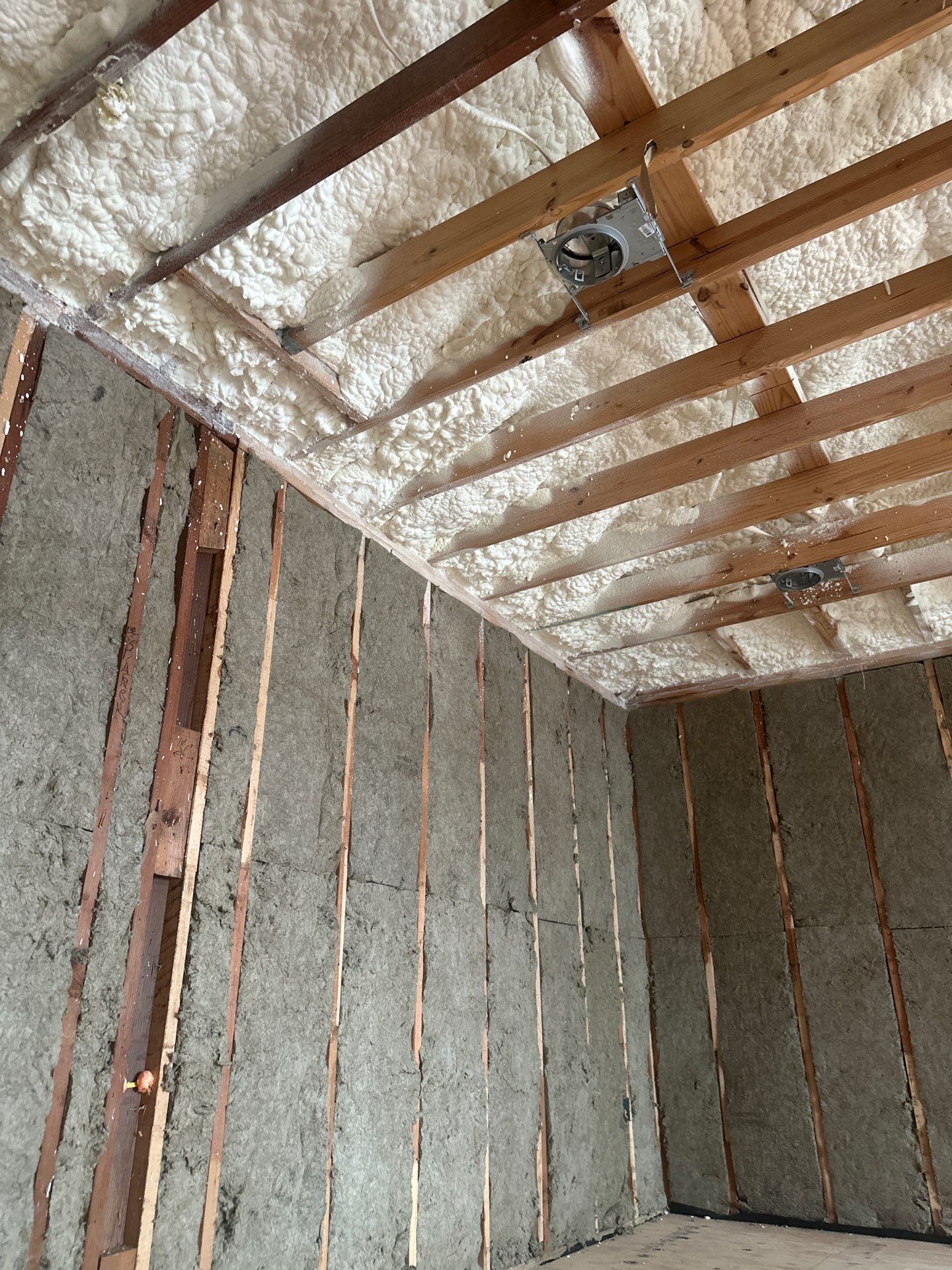 Open cell spray foam & rockwool job completed in Dallas TX by Apex Insulation Solutions