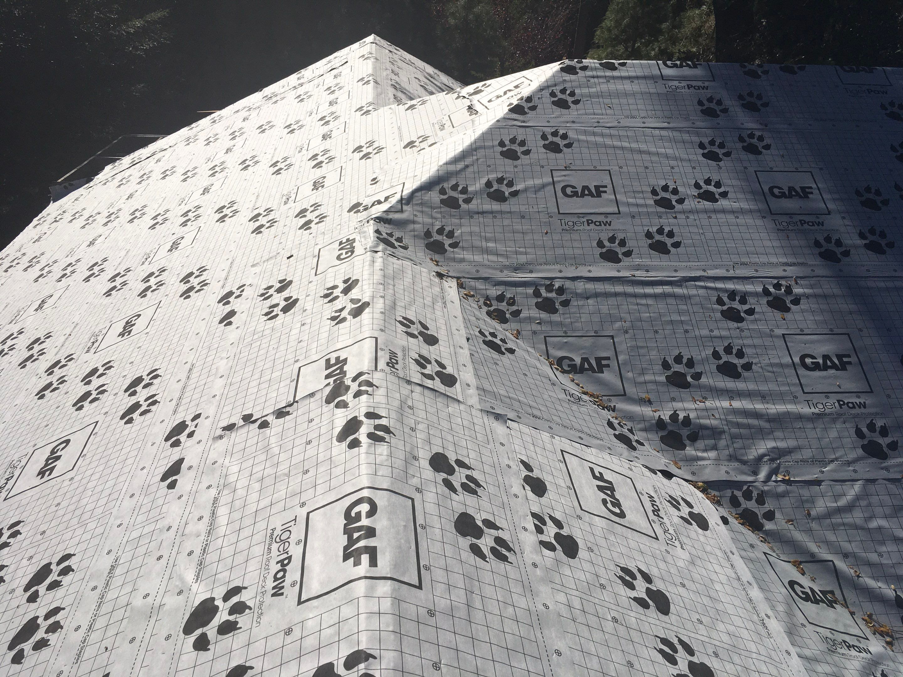 Metal roofing installation using Standing seam metal roofing system by Straight Edge Roofing Inc