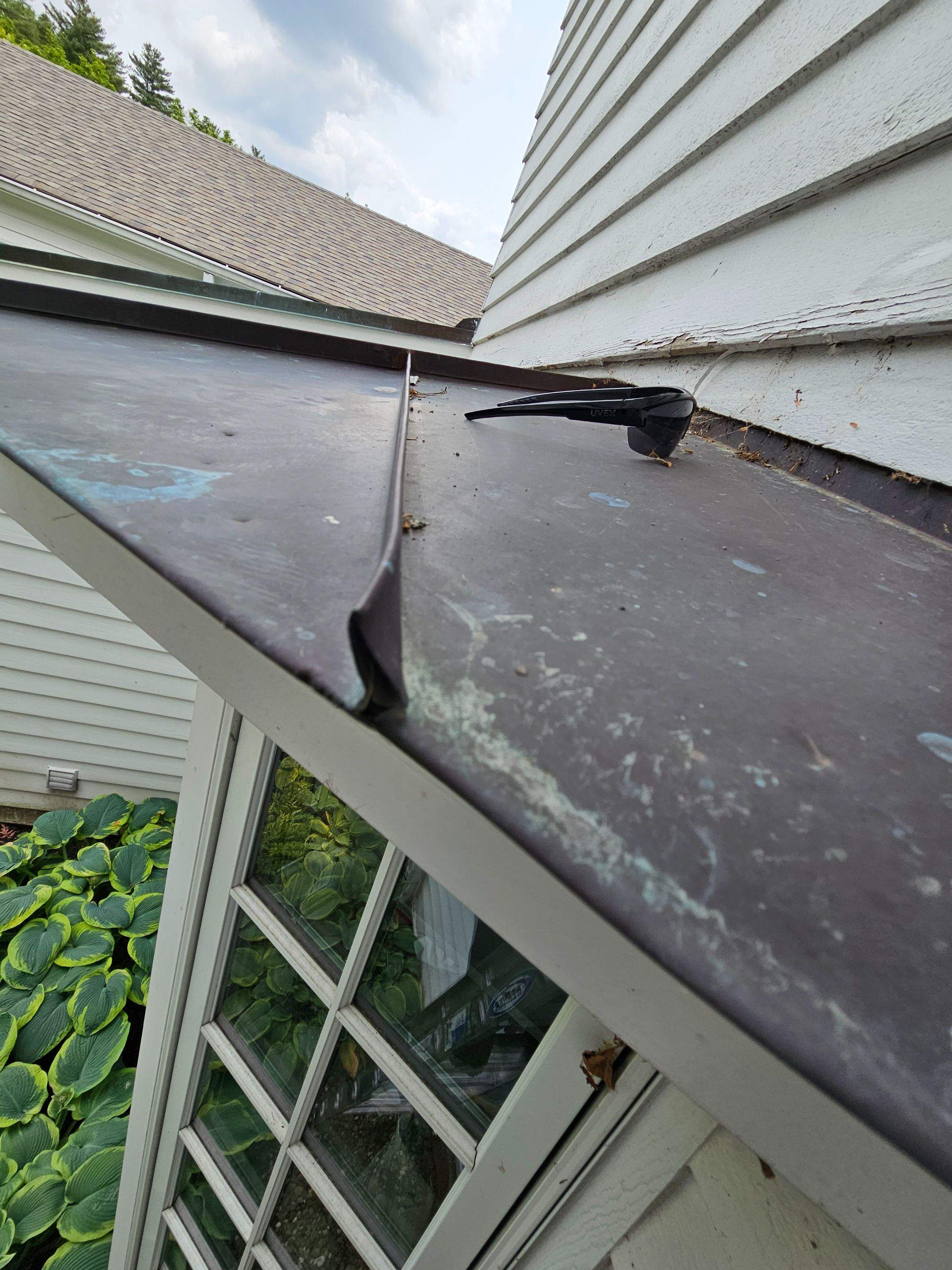Copper Roof using Copper by Absolute Roofing and Construction