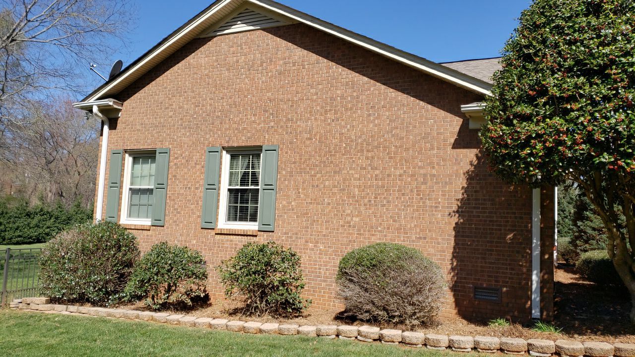 House Wash using cleaner by Power Wash Masters LLC