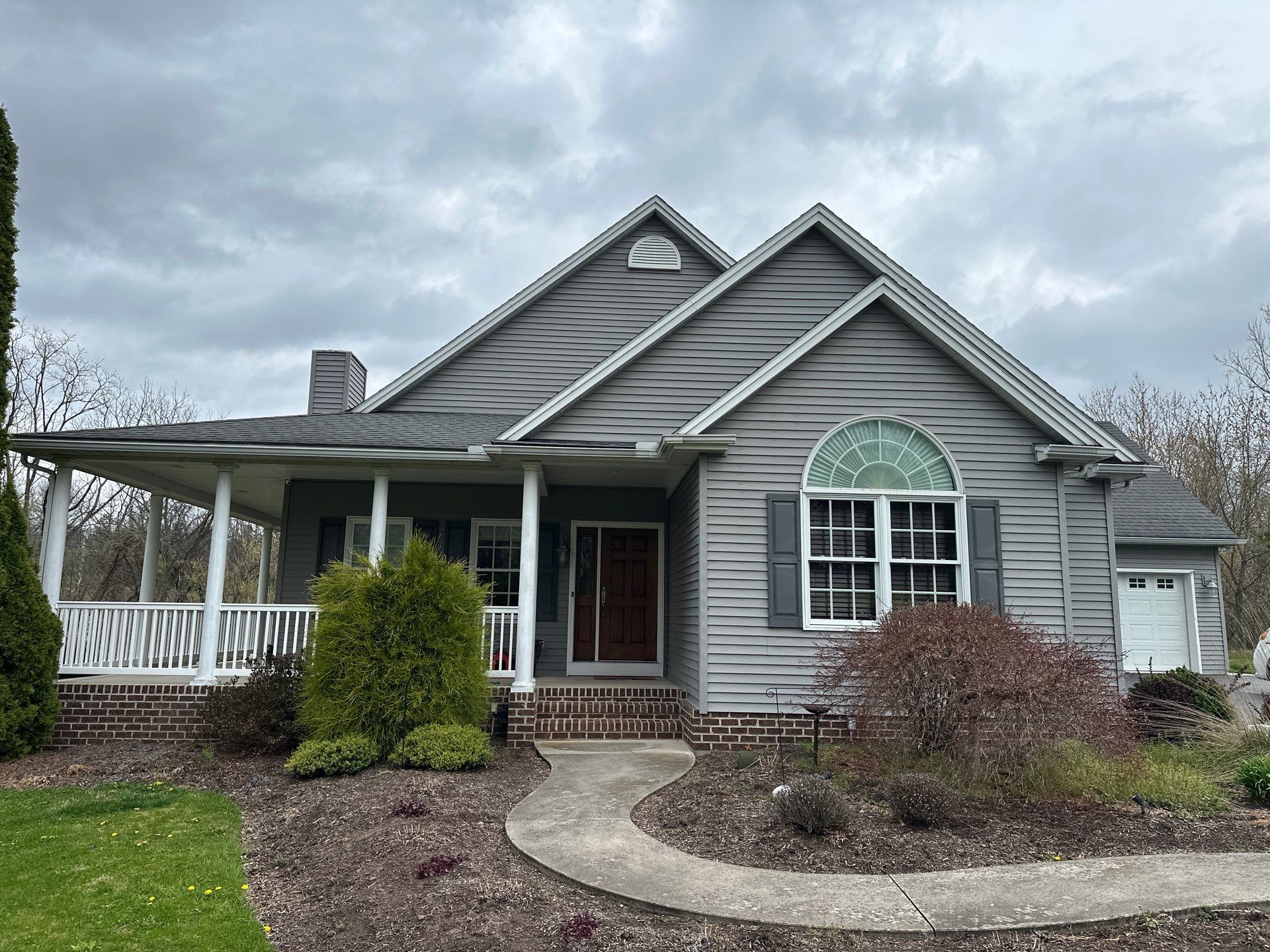 Full Vinyl Siding Replacement and Shingle Roof Install in Millersburg by Esh Builders