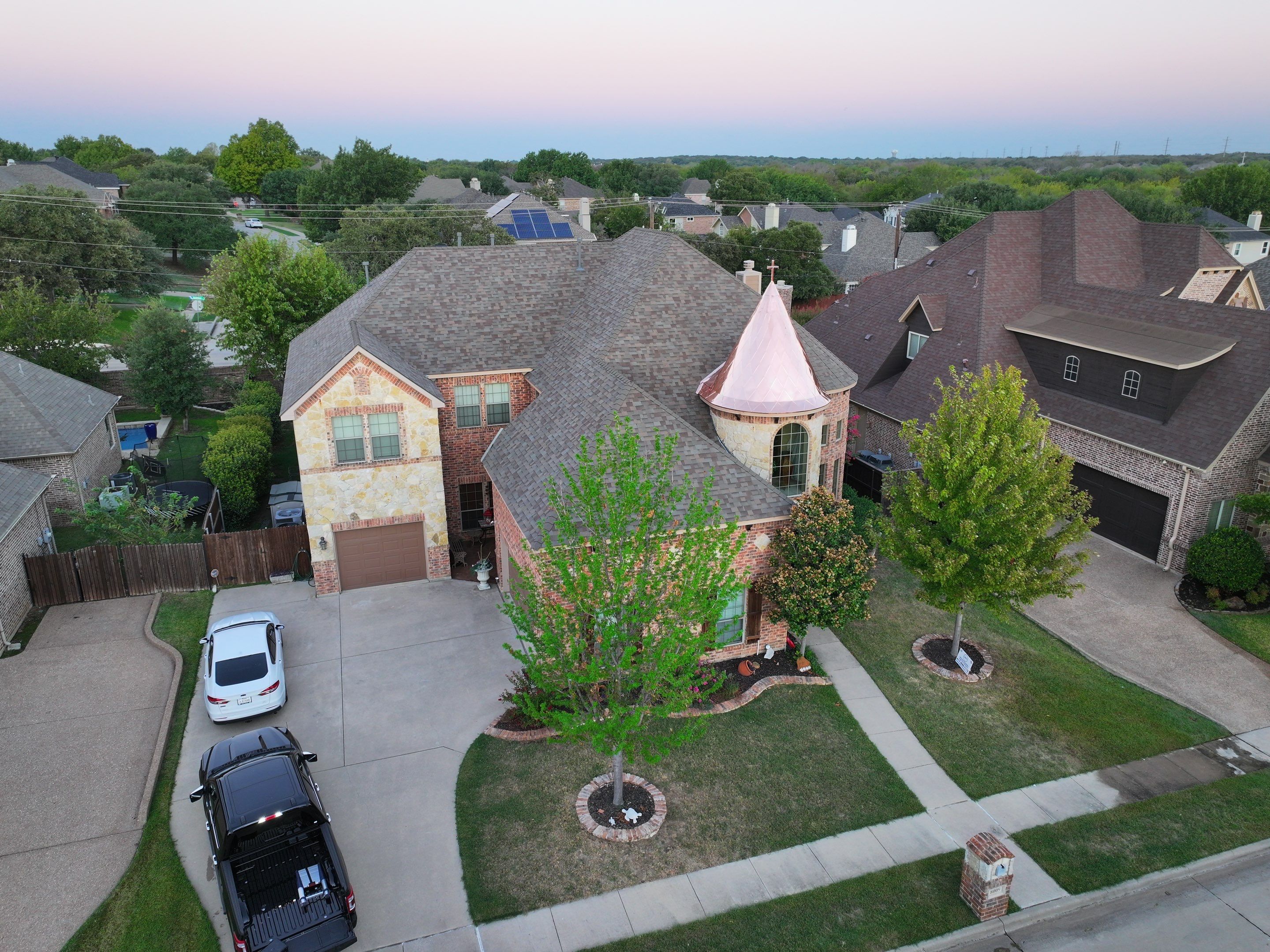 Installing Custom copper turret and Malarkey Vista Class 4 shingles Hail Damage Upgrade by Becker Roofing and Exteriors