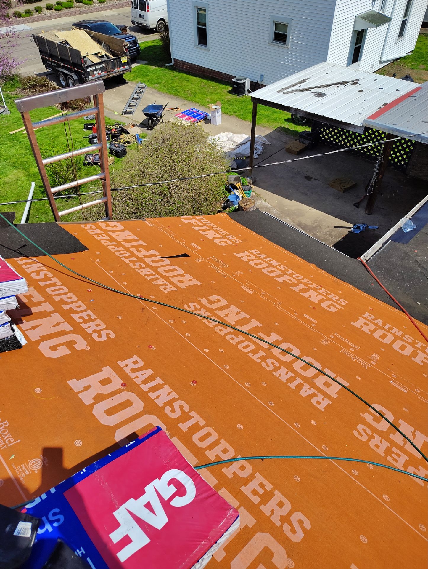 Residential Roofing Installation using GAF Timberline HDZ Charcoal by Rainstoppers Roofing