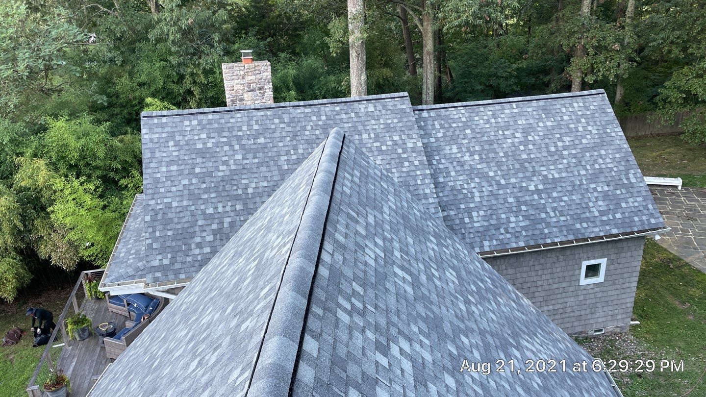 Roof Replacement using IKO Dynasty by American Home Contractors