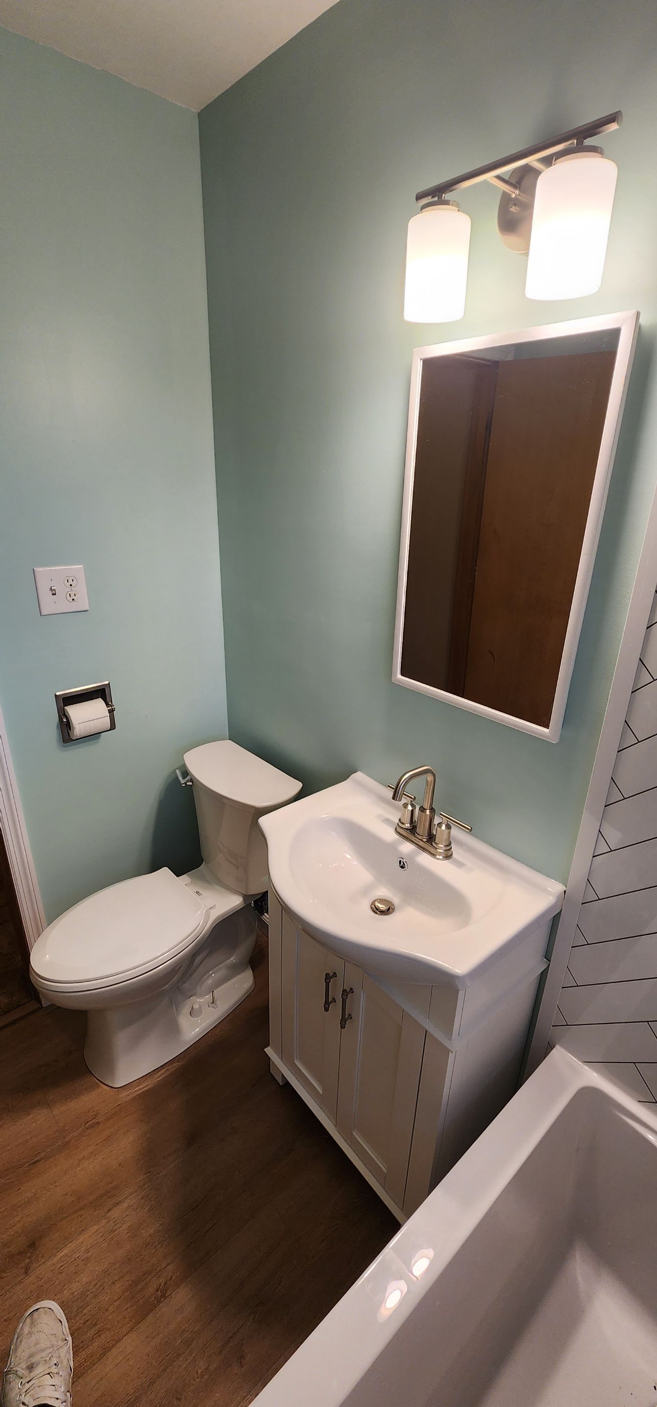 Tiny Bathroom Remodel by The Shower Company