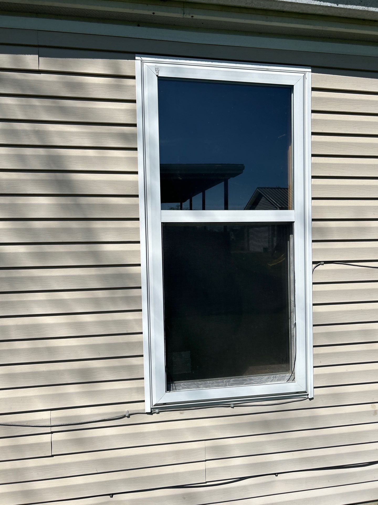 Roof and Siding Replacement using Norandex Cedar Knoll Graphite Siding and Owens Corning Durations in Onyx Black by WIW Enterprises Inc